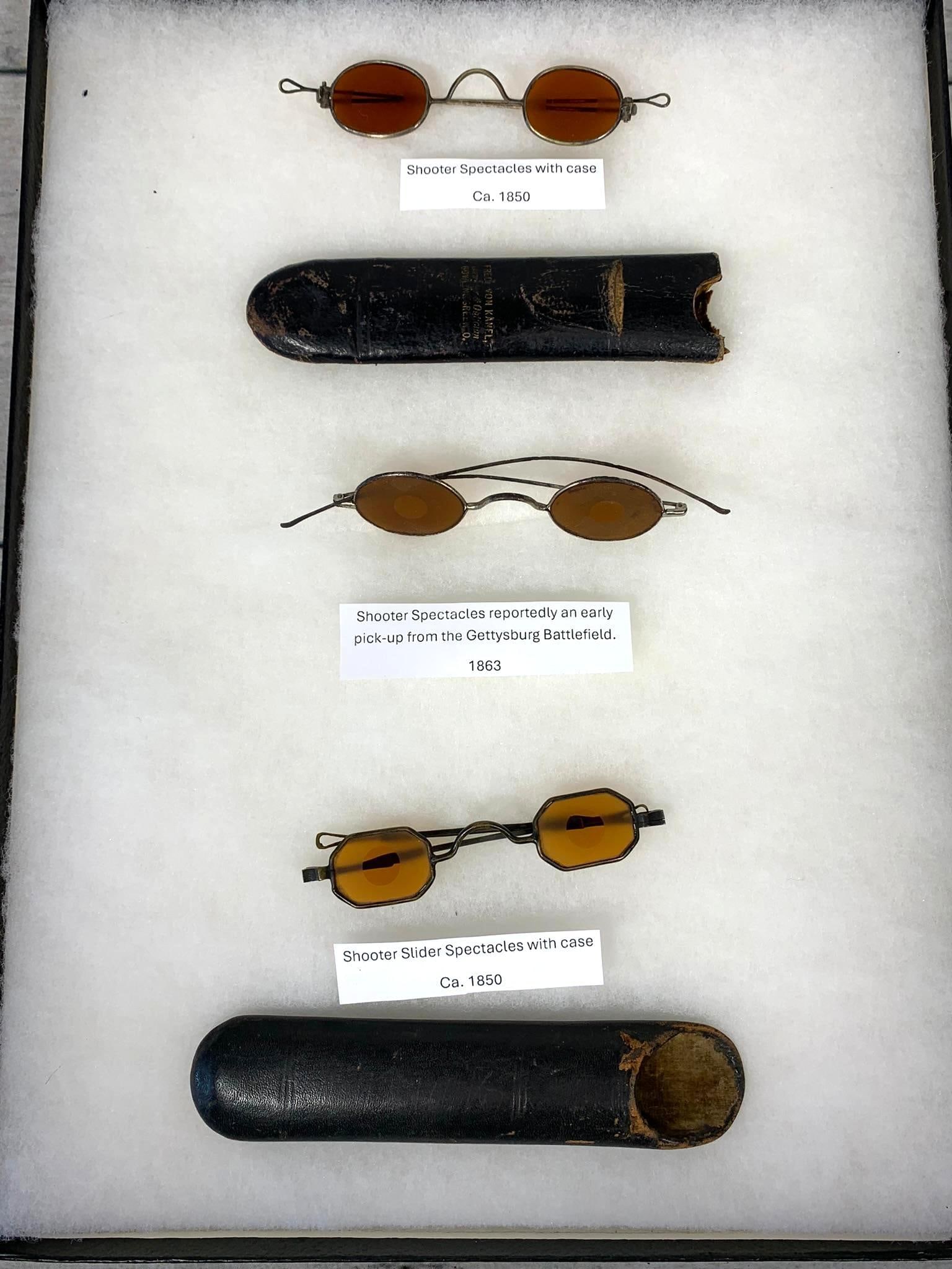 Group of Three Antique 19th Century Shooter Spectacles with Padded Display Case: In house shipping available. Pickup is Tuesday, Oct. 29 from Noon to 7 pm at our offices in Carroll, OH 43112 or we will provide in-house shipping for this item. We charge a $5/lot fee if you pick up