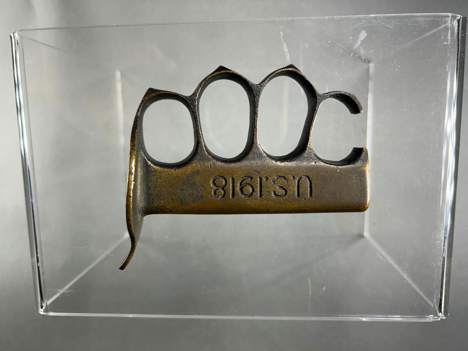 WWI Au Lion Trench Knife Grip: World War One French made au lion trench knife grip. This lot contains only the grip. Condition is as shown in the photographs. In-house shipping is available. Open pickup is Tuesday, Oct. 29 from Noo