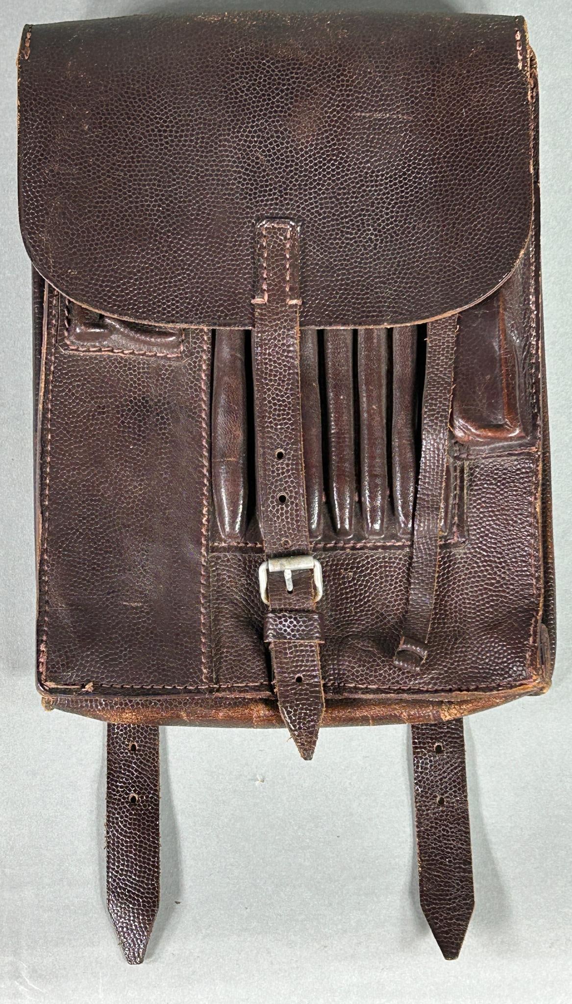 WWII Nazi German Map Case by Goch 1939: World War Two Nazi German Wehrmacht map case maker stamped and dated on the inner flap. Dark brown pebbled leather case and straps in excellent condition with all leather pliable. Does not appear to h