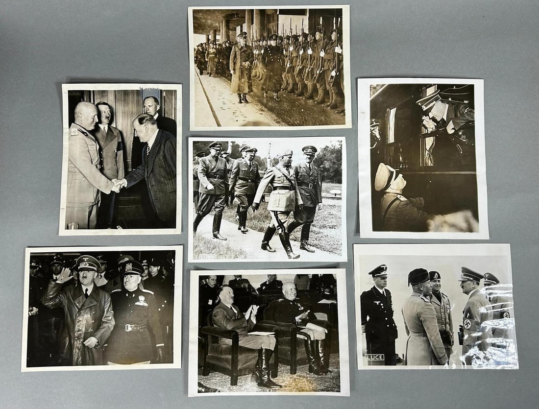 WWII Adolf Hitler & Benito Mussolini Press Photograph Lot 1937 - 1941: World War Two press photo lot featuring seven photographs of Nazi German leader Adolf Hitler with the Fascist leader of Italy, Benito Mussolini. These are A.P. Photo and International News Photo image
