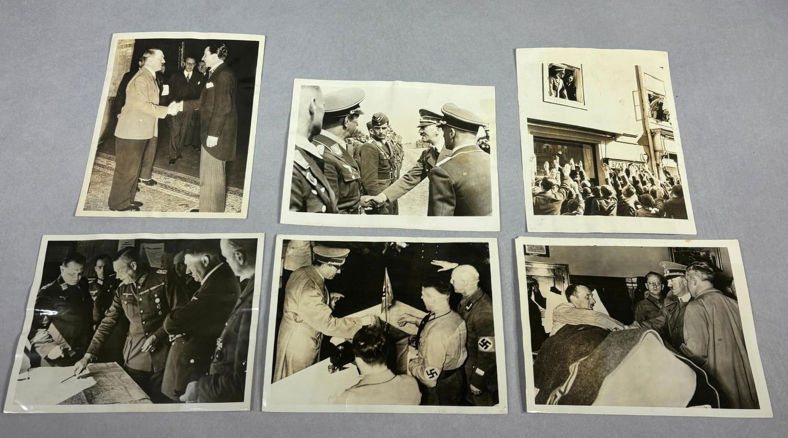 WWII 1938 - 1939 Adolf Hitler Press Photograph Lot - Poland and Austria: World War Two Nazi German leader Adolf Hitler featured in 6 press photographs that are related to the Invasion of Poland or anschluss (annexation) of Austria. These are International News Photo images