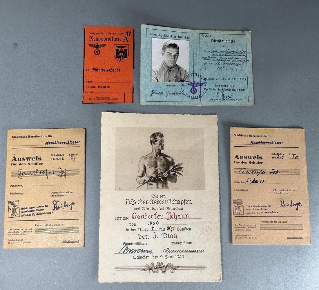 WWII Nazi German HJ Hitler Youth Competition Certificate & school identification cards: Nazi German World War Two ephemera grouping identified to Johann Gandorfer featuring a Munich Hitler Youth award certificate awarded to him for a third place finish at the Hitler Youth equipment compe