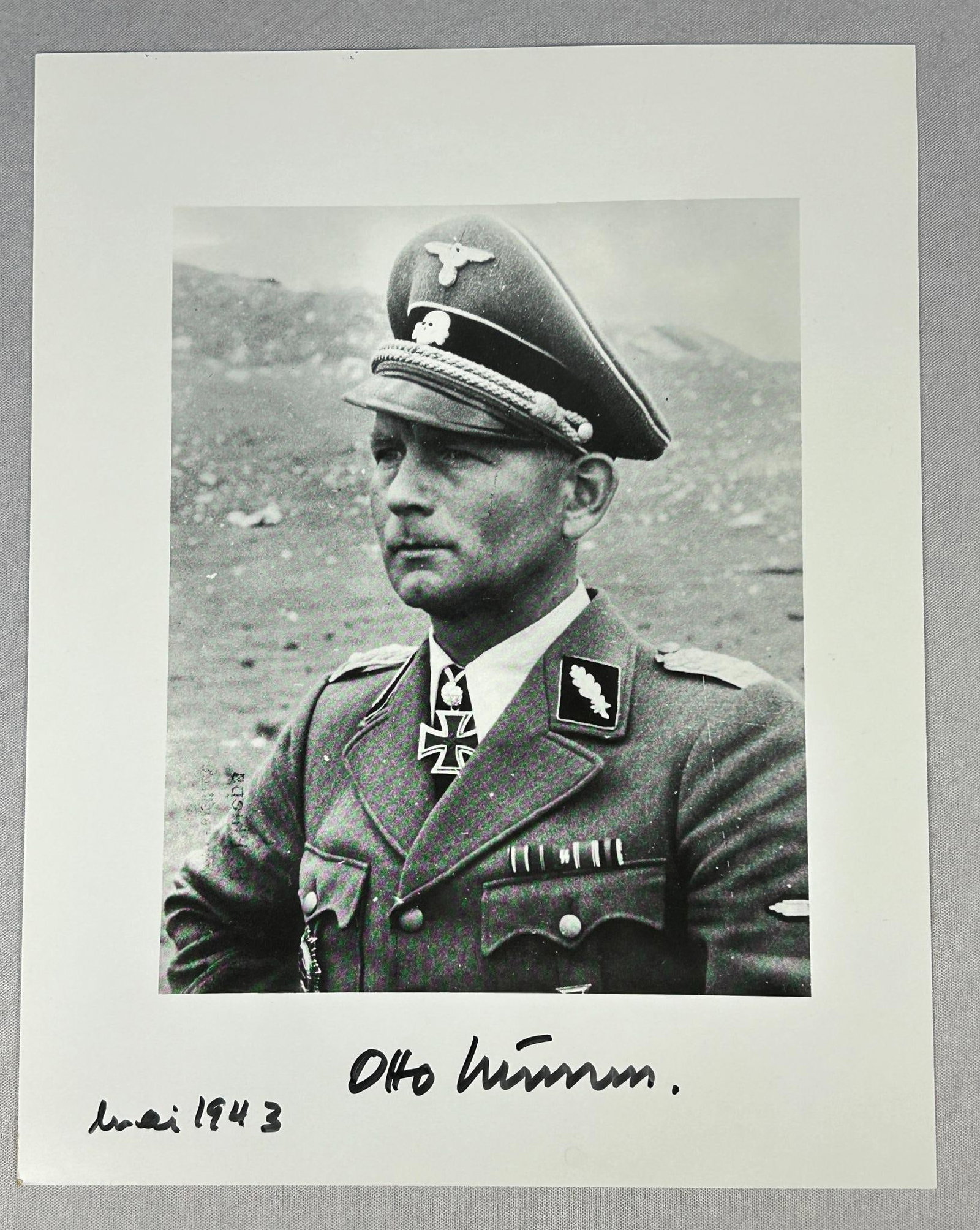 WWII Nazi German General Otto Kumm Post War Autograph & Photograph - Knight's Cross Recipient: World War Two Waffen SS General Otto Kumm Post War Autograph on a copy photograph of him taken in May, 1943 m wearing his Knight's Cross of the Iron Cross. Photograph measures 7.75" x 9.875". Kumm com