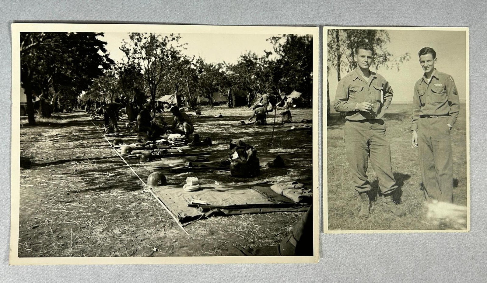 World War Two Large format 3rd Infantry Division Photographs: Two World War Two original war time (not post war reprints) 3rd Infantry Division photographs including a 10.125" x 8" photo of a company of men in the field with there gear laid out. Helmets with 3rd