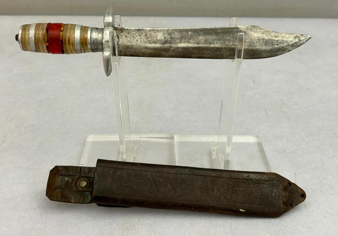 WWII U.S. Theater Made Fighting Knife Bowie Style Blade: World War Two theater made fighting knives including a 12" knife with 7.25" bowie style clip point blade. The guard is made of aluminum with inlaid glass and the guard is made of clear plexiglass - pe