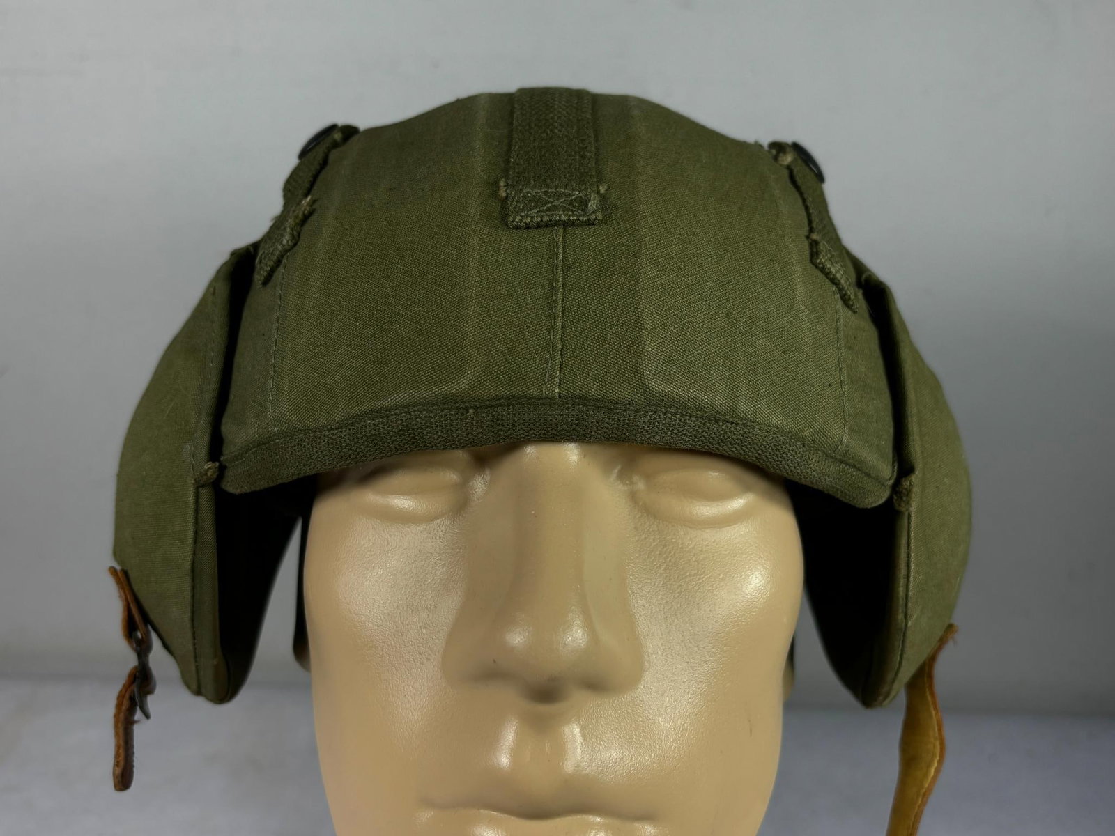 WWII U.S. Army Air Force M4A2 Flak Helmet - Near Mint: World War Two Near Mint - Mint condition United States Army Air Force AAF M4A2 flak helmet. This model was introduced in June 1944 and consists of three steel pieces; the skull and two deep hinged ear