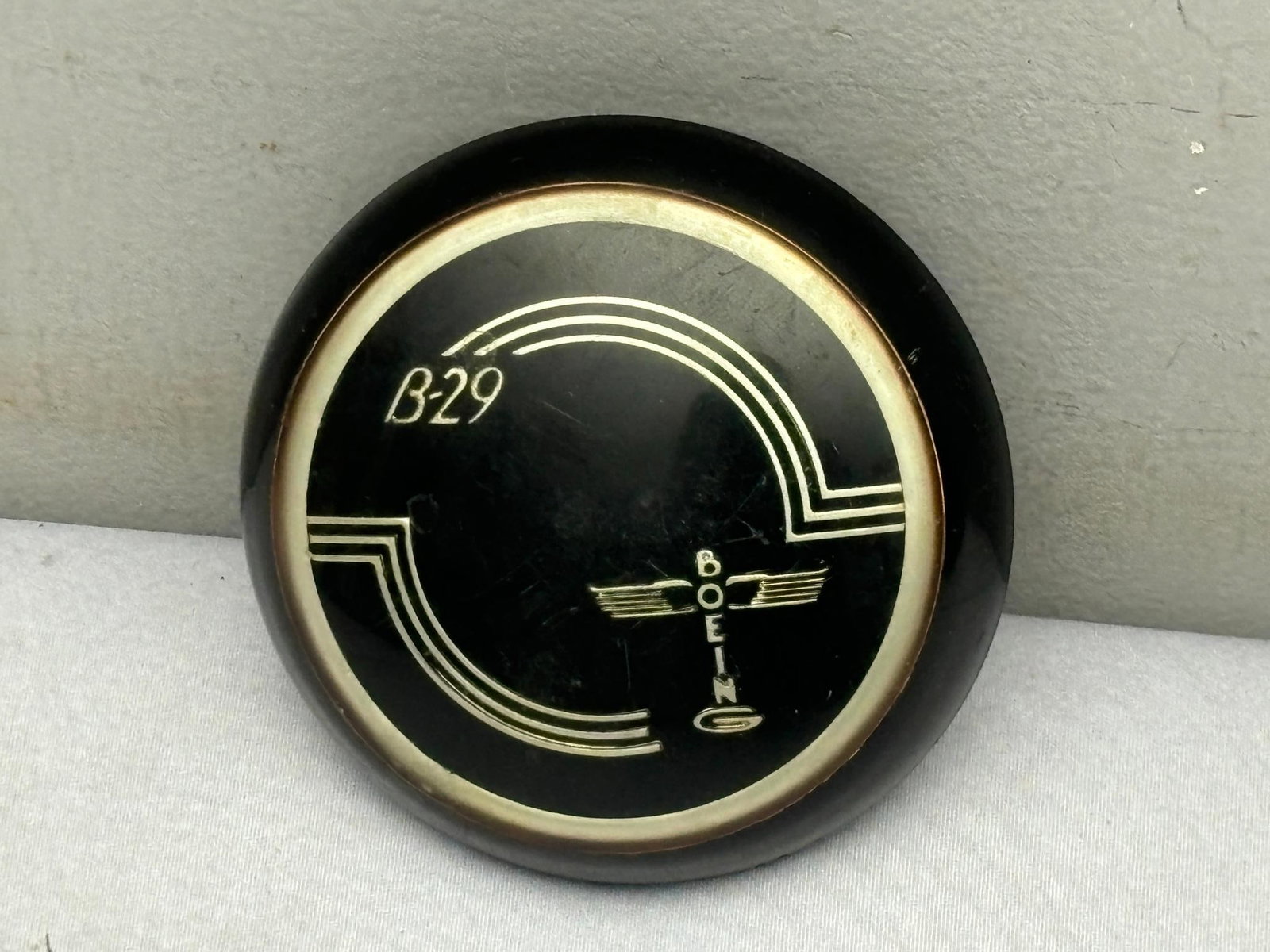 WWII U.S. AAF B-29 Superfortress Control Wheel Cap: World War Two U.S. Army Air Force Boeing made control wheel cap for the B-29 Superfortress. Marked 6-14657 on the underside. Excellent condition. The B-29 was the primary aircraft used in air raids on