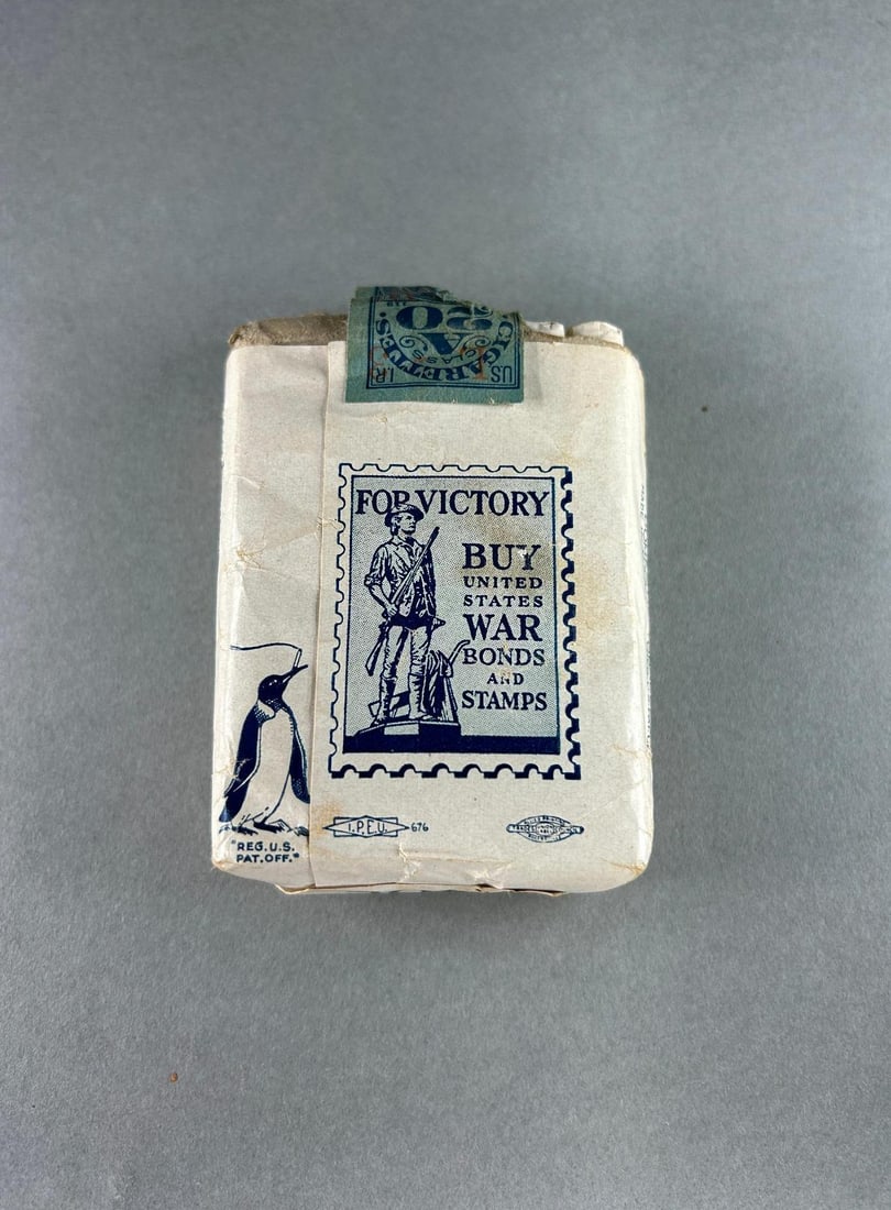 WWII Full Pack of Kool Cigarettes with "Buy War Bonds" Logo: World War Two pack of Kool cigarettes with a war bonds imprint on the back of the package that features a Revolutionary War Minuteman with the slogan "FOR VICTORY BUY United States WAR bonds and stamp