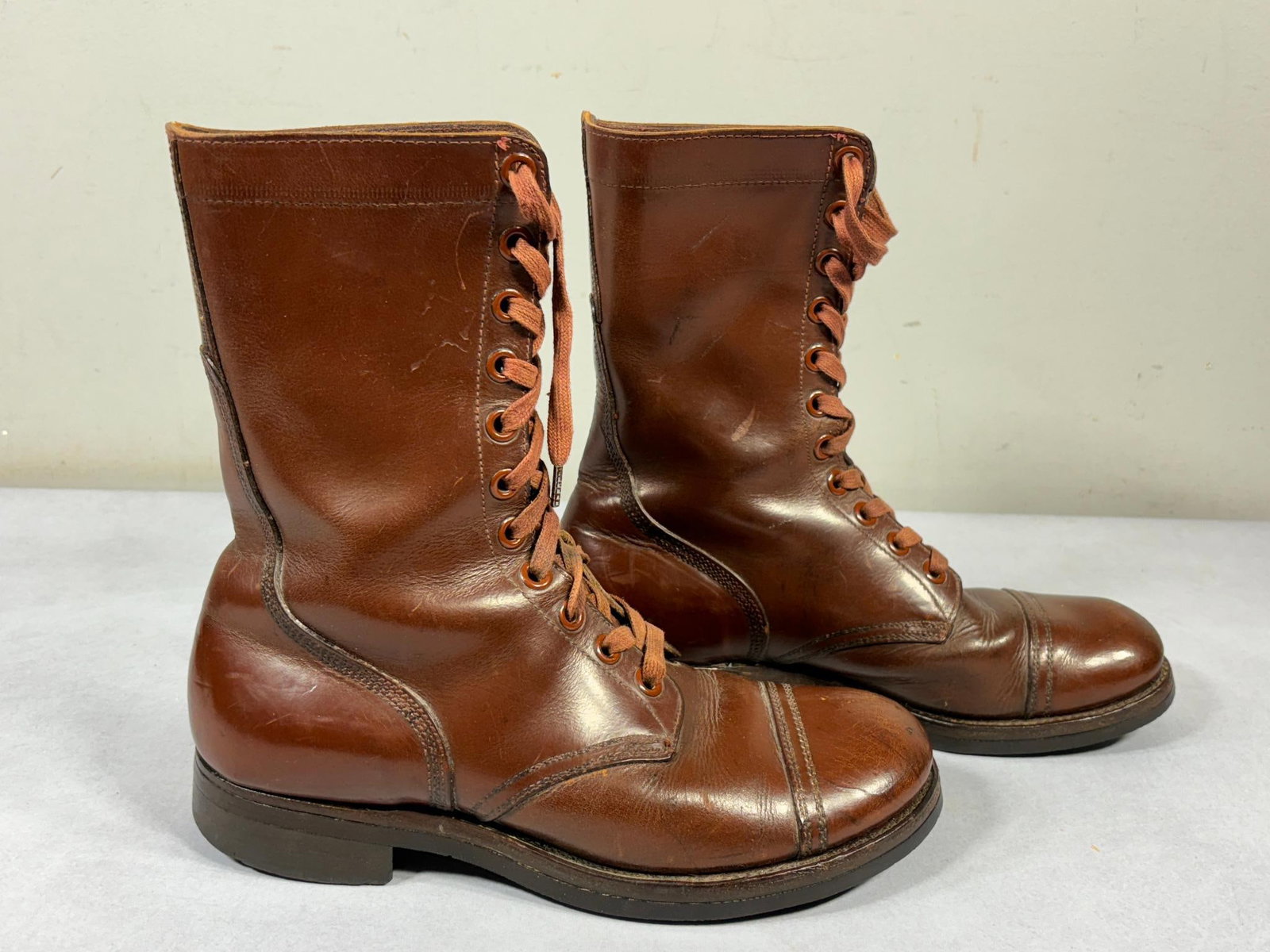 Korean War U.S. Army M48 Brown Russet Boots: Korean War United States Army Model 48 combat boots NOS (new old stock). BF Goodrich soles. Boots are not marked but they measure 12" from toe to back of heels. In-house shipping is available. Open pi