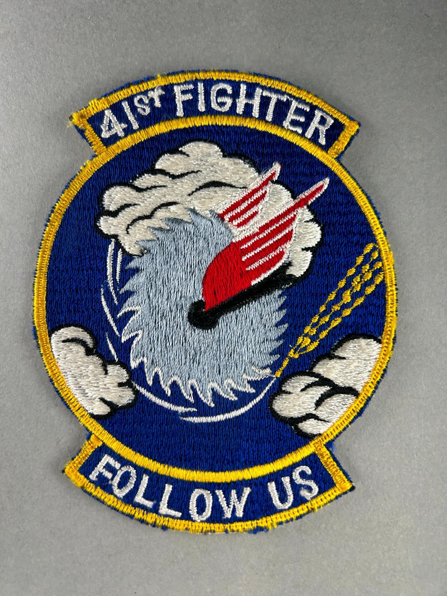 U.S. Cold War 41st Fighter Interceptor Squadron Patch Japanese Made: United States Air Force Cold War era 41st Fighter Interceptor Squadron patch. Japanese made patch most likely made on Okinawa. Measures 4.625" x 3.75". In-house shipping is available. Open pickup is T