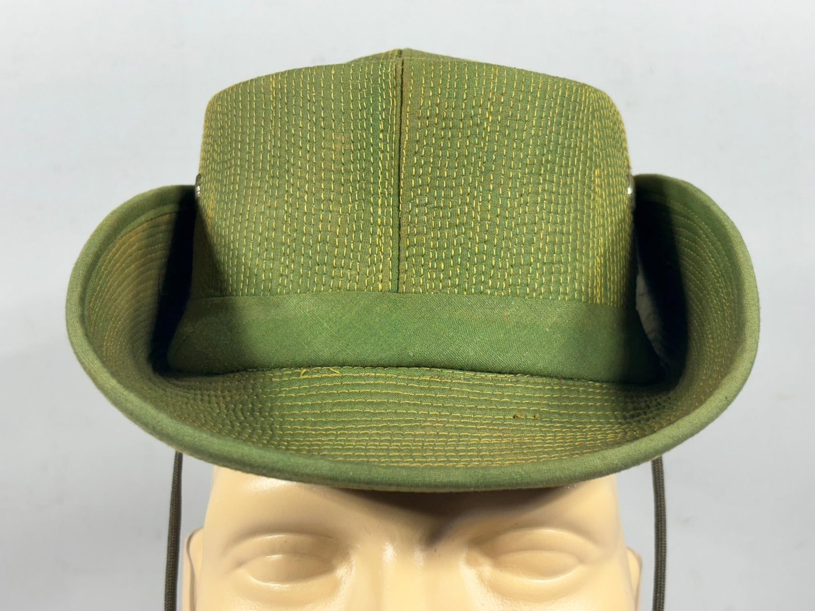 Vietnam War Theater Made Boonie Hat - With Viet Nam -Can ThoTab: Vietnam War Theater made souvenir boonie hit with VIET NAM CAN THO tabs on the side. Next to the Can Tho tab is a "Tonkin Gulf Yacht Club" pin.)Entire body and lining is reinforced with rows of stitch