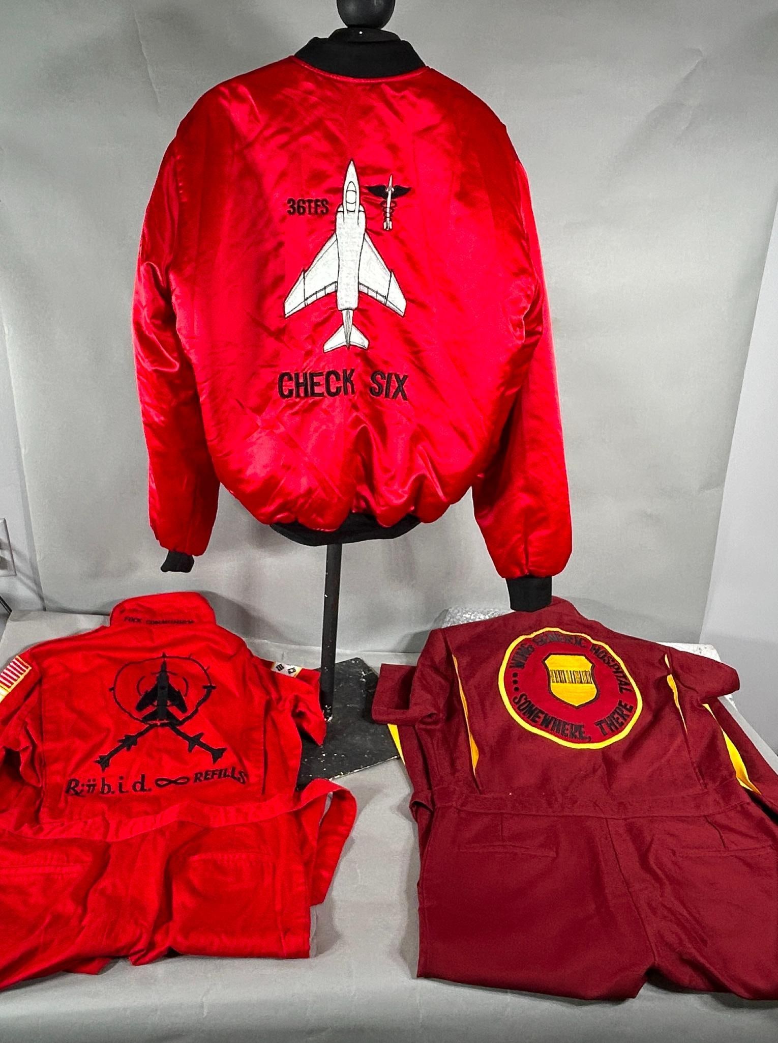 Vietnam War Era 36th Fighter Squadron Party Suit with Obscene Anti Communist Message: Vietnam War era 36th Tactical Fighter Squadron party suit ensemble including 2 party suits and a jacket. All three pieces are made of polyester and identified to a medical flight officer "Leo".1. One 