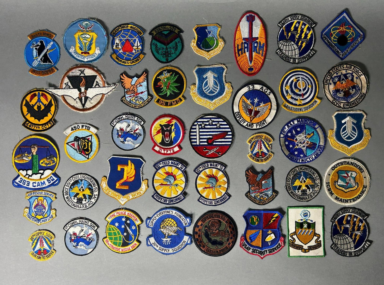Post WWII U.S. Air Force Patch Lot Including Squadron Patches: Post World War Two United States Air Force Patch lot of 40 patches. Squadron patches are included in this lot with several being 4" diameter. In-house shipping is available. Open pickup is Tuesday, Oc