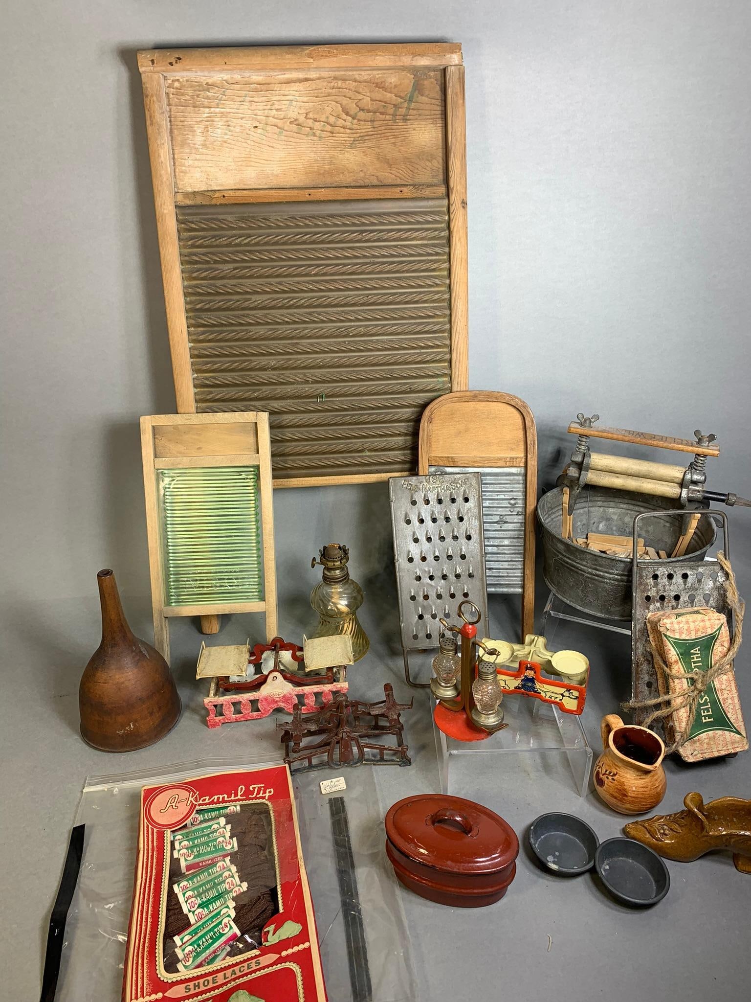 Antique Washboards, Relief Washer Wringer, Balance Scales, Graters, Shoe Laces and More: LiveAuctioneers only gives us 20 photos per lot. We typically take many more than that. See this sale on Proxibid to see many more. In-house shipping is available. Open pickup is Friday, Nov. 1 from N