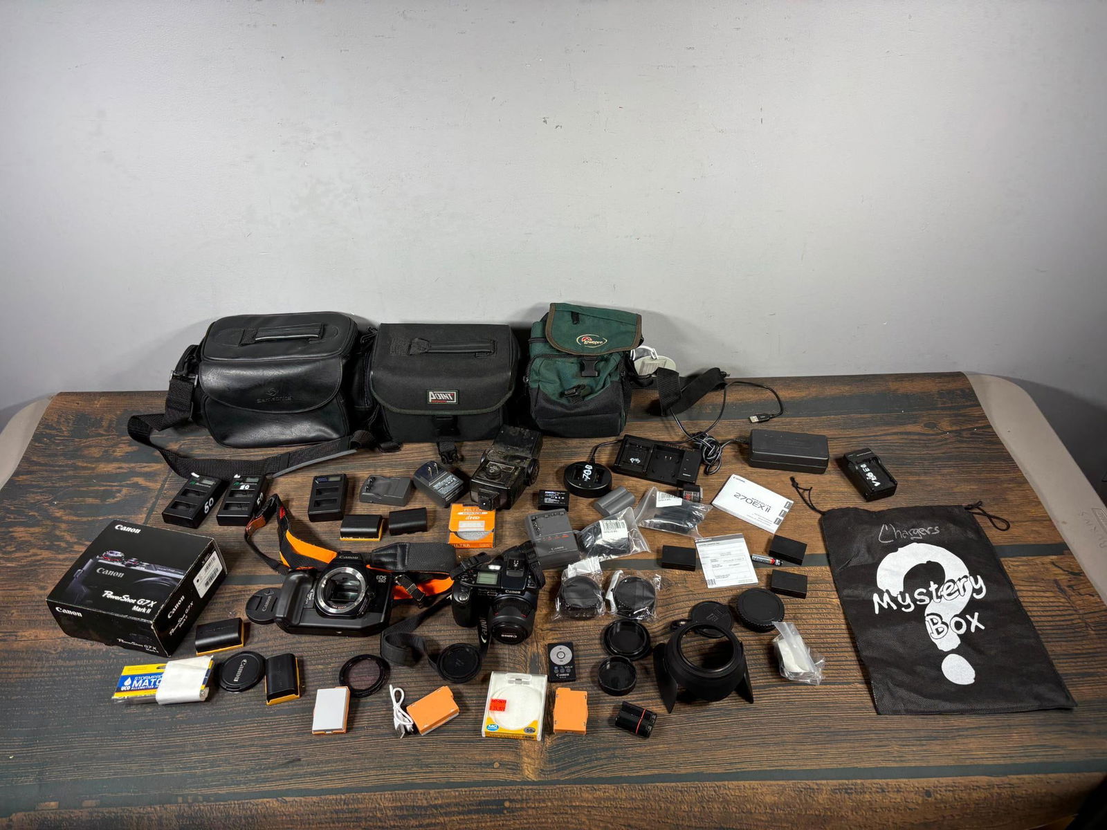 Large Lot of Camera Equipment: Cameras, Camera Bags, Lenses, LEns Caps, Battery Chargers, and More (1 of 18)