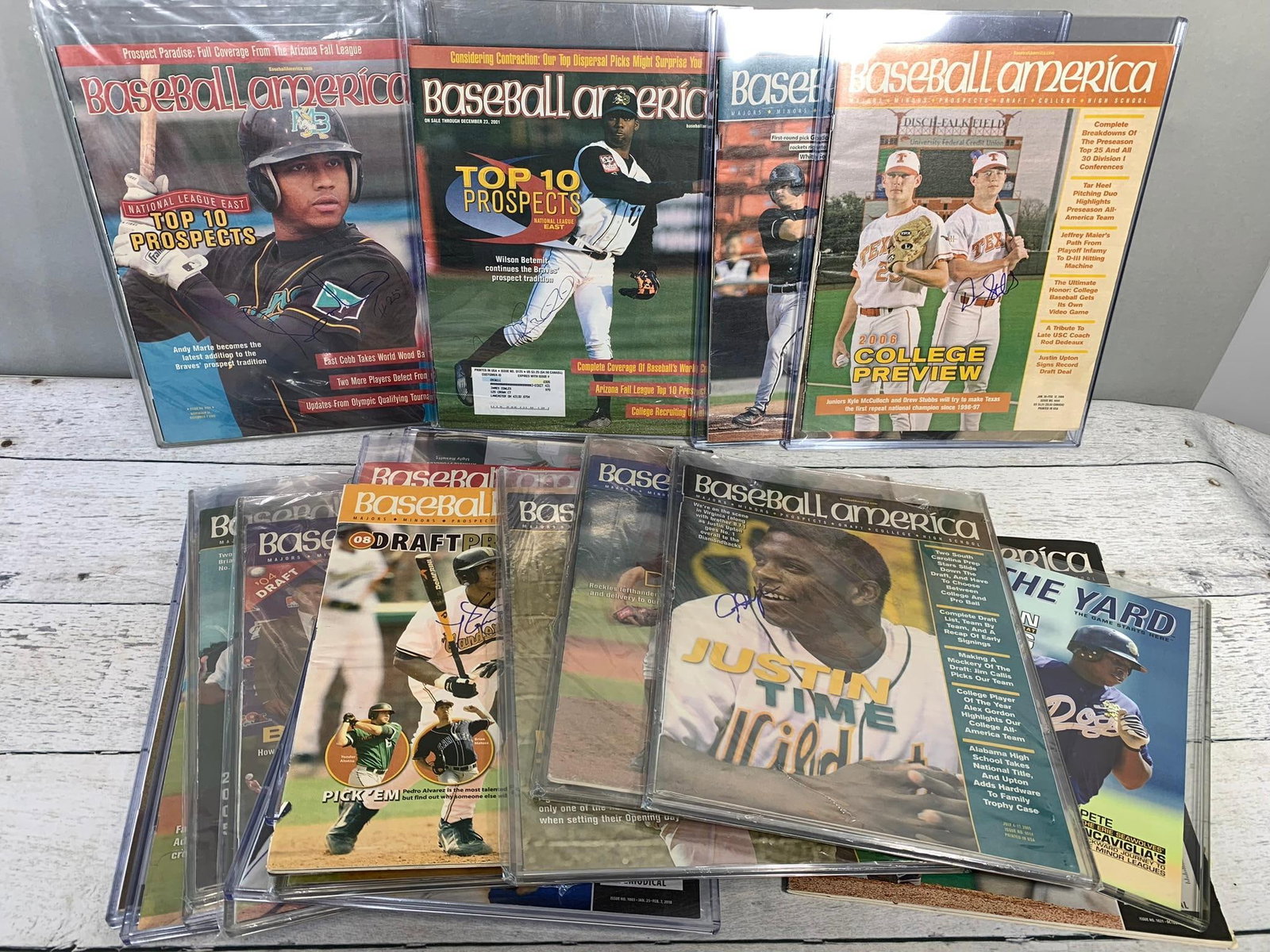 Nineteen Baseball America Magazines with Autographs: In-house shipping is available. Open pickup is Thursday, Nov. 21 from 10 am to 7 pm at our offices in Carroll, OH 43112 or we will provide in-house shipping for this item. We charge $5/lot if you want