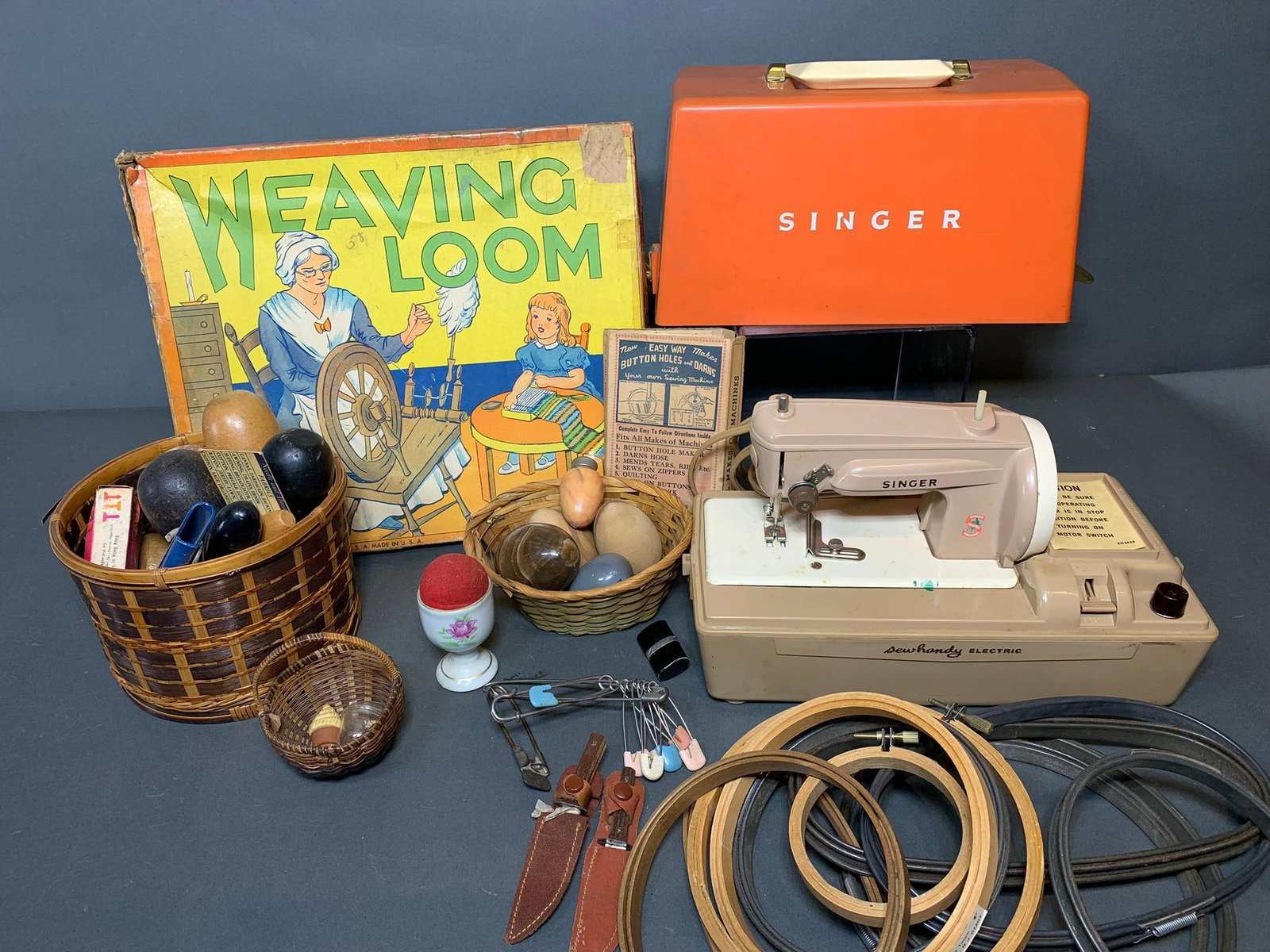 Vintage Childs Singer Sewing Machine, Vintage Weaving Loom and Other Sewing Related Items: In-house shipping available. Pickup is Wednesday, April 30 from 1 pm to 7 pm at our offices in Lancaster, OH 43130 or we will provide in-house shipping for this item. We charge a $5/lot fee if you pic