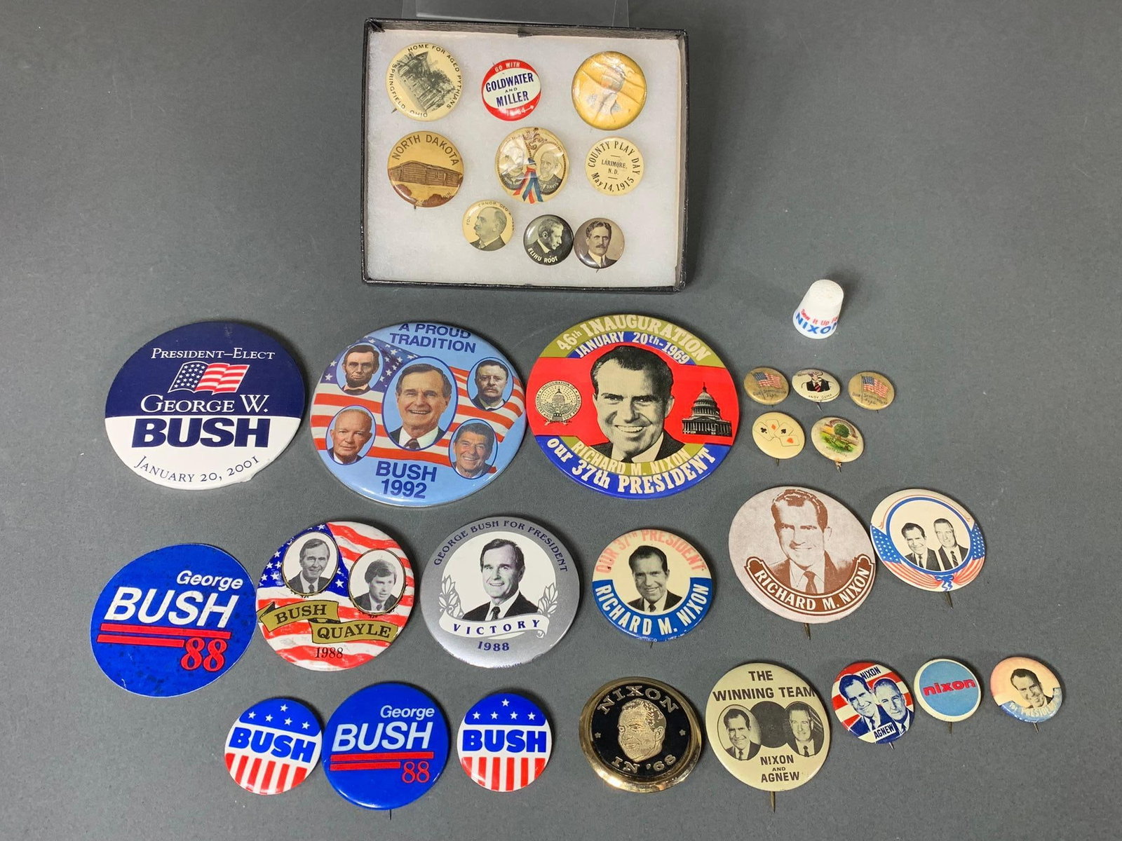 Vintage Political Buttons, Thimble and Small Group of Antique Political Buttons: In-house shipping available. Pickup is Wednesday, April 30 from 1 pm to 7 pm at our offices in Lancaster, OH 43130 or we will provide in-house shipping for this item. We charge a $5/lot fee if you pic