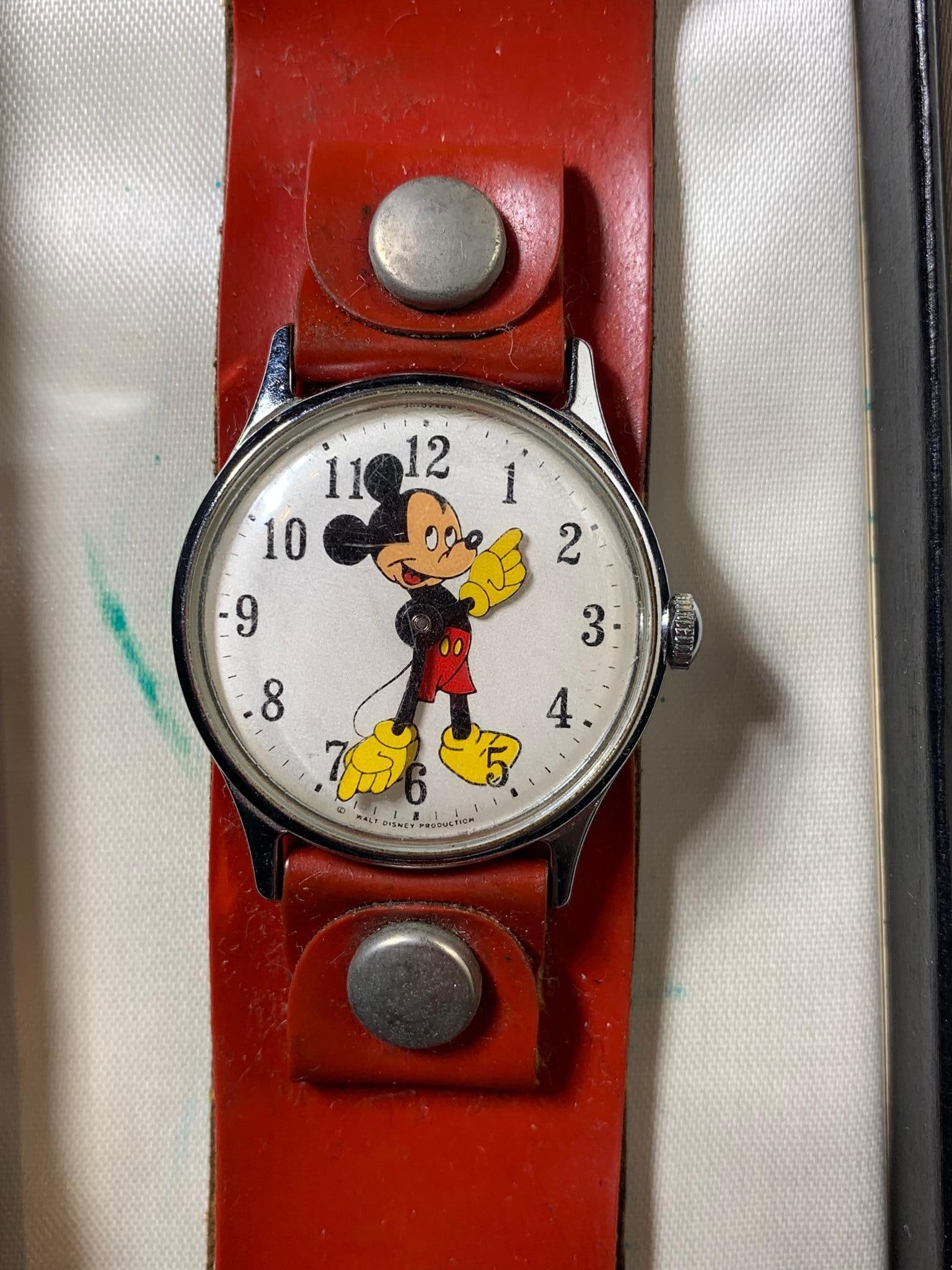 Vintage 60's /70's Ingersoll Disney Mickey Mouse Watch - Used: In original box. The watch winds but does not run. In-house shipping available. Pickup is Wednesday, April 30 from 1 pm to 7 pm at our offices in Lancaster, OH 43130 or we will provide in-house shippi