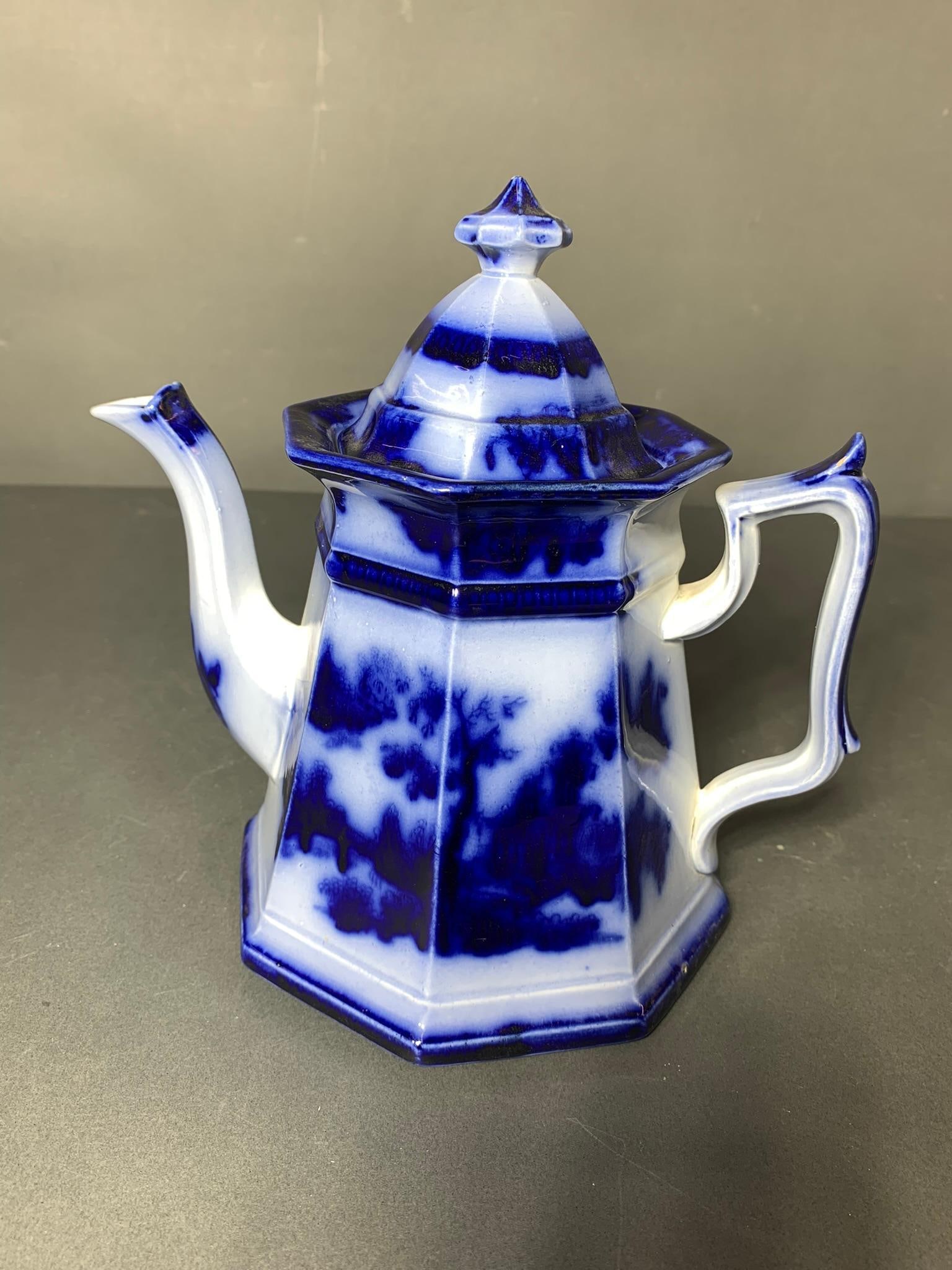 Nice Antique Flow Blue Teapot. Measures 9" high. (1 of 9)