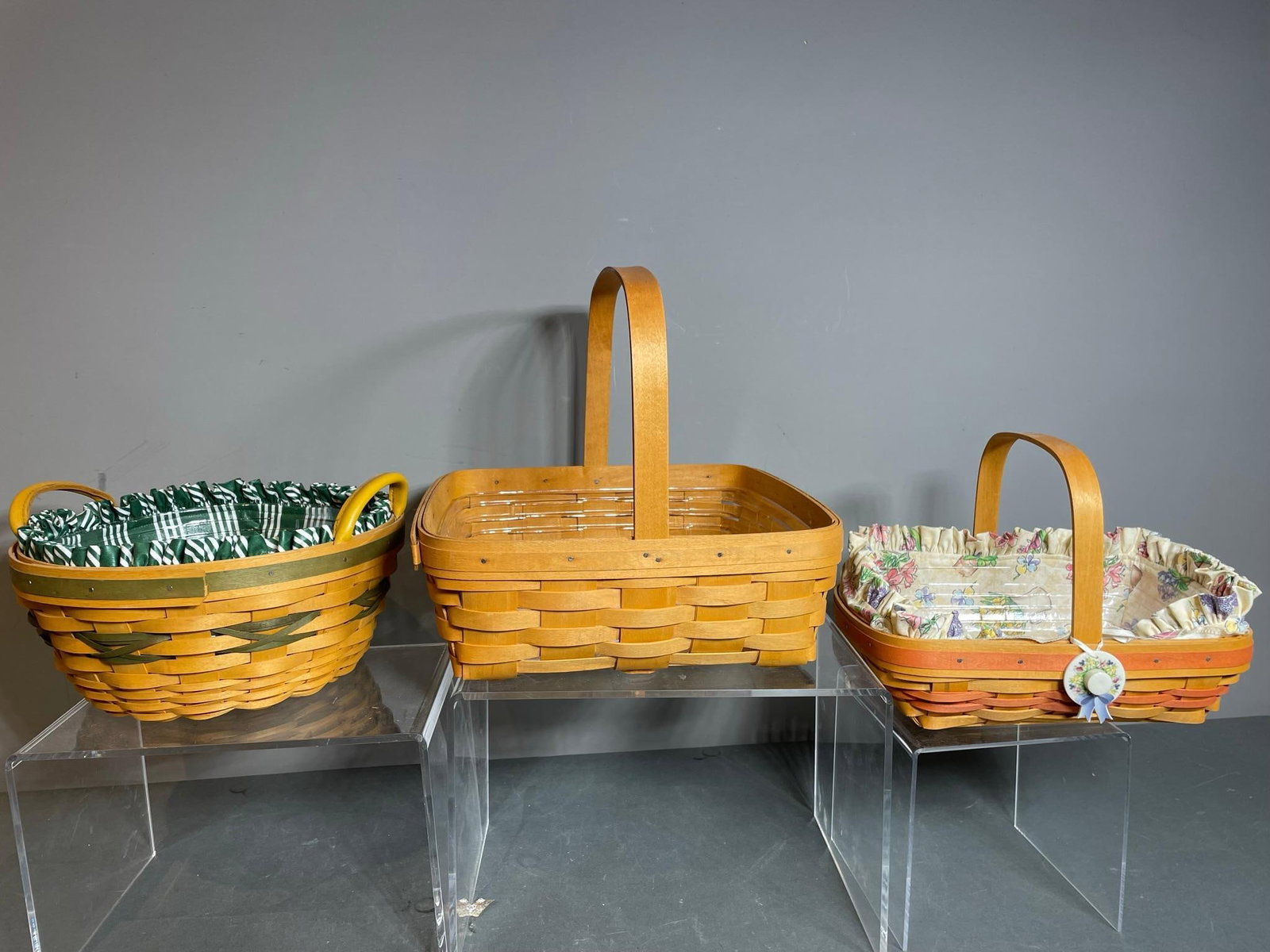 Three Vintage Longaberger Baskets: In-house shipping available. Pickup is Thursday, May 29 from from 1 pm to 7 pm at our gallery in Lancaster, OH 43130 or we will provide in-house shipping for this item. We charge a $5/lot fee if you p