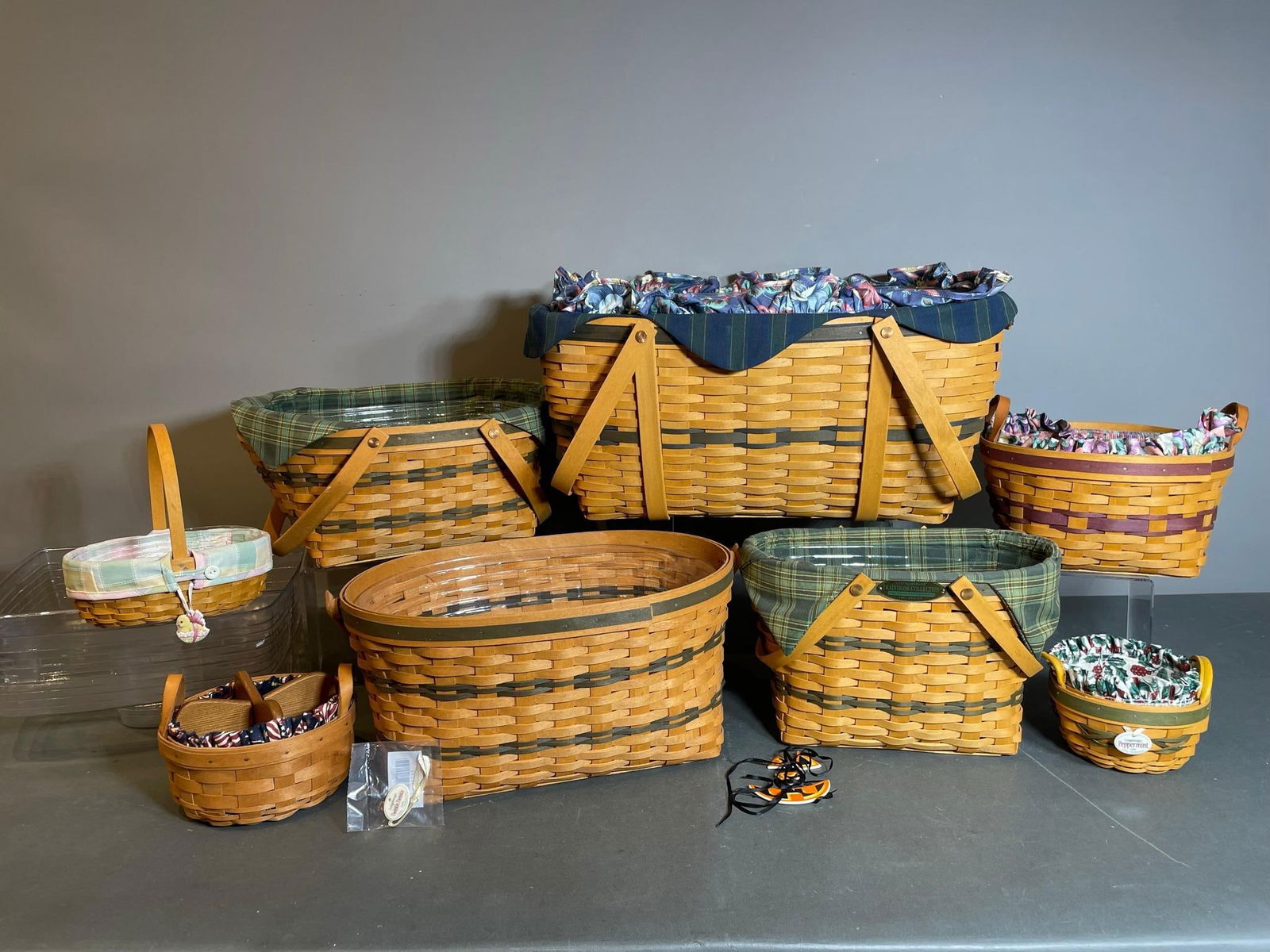 Group of Longaberger Baskets and Jack O Lantern Attachment: In-house shipping available. Pickup is Thursday, May 29 from from 1 pm to 7 pm at our gallery in Lancaster, OH 43130 or we will provide in-house shipping for this item. We charge a $5/lot fee if you p