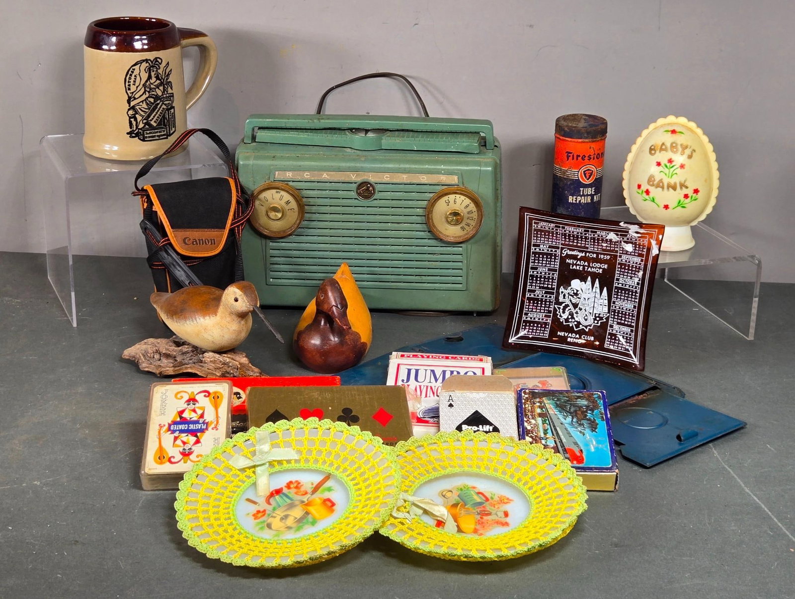 Vintage Radio, Playing Cards, Game Dice, Carved Birds, Camera & More: In-house shipping available. Pickup is Thursday, May 29 from from 1 pm to 7 pm at our gallery in Lancaster, OH 43130 or we will provide in-house shipping for this item. We charge a $5/lot fee if you p