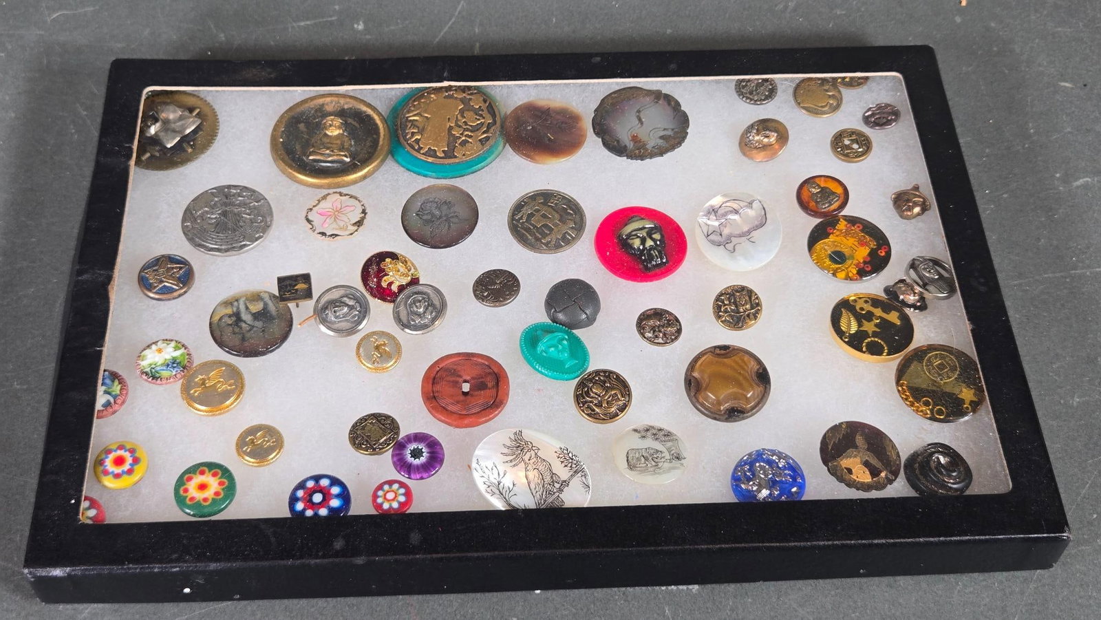 Group of Vintage Buttons Including Ceramic, Stone, Metal and More: With Case. In-house shipping available. Pickup is Thursday, May 29 from from 1 pm to 7 pm at our gallery in Lancaster, OH 43130 or we will provide in-house shipping for this item. We charge a $5/lot f