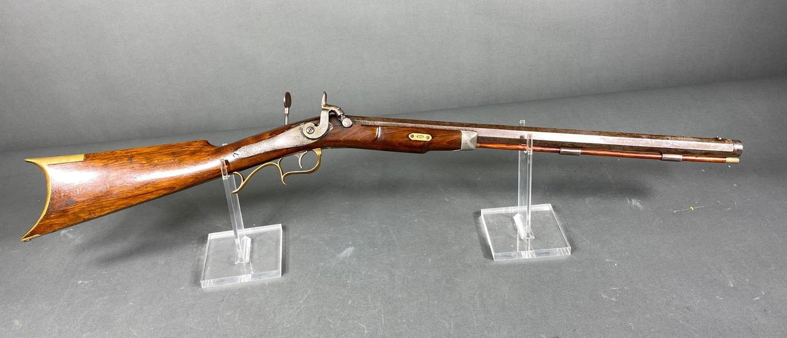 32 Cal Small Percussion Rifle w/Peep Sight 19th c.: MFG/IMPORTER: No markings MODEL: Target rifle SERIAL: NSN. CALIBER/GAUGE: Approximately 32 cal. CONDITION: Action good, bore good. SIZE: 20.5" bbl. This item is either black powder or pre 1898, and th