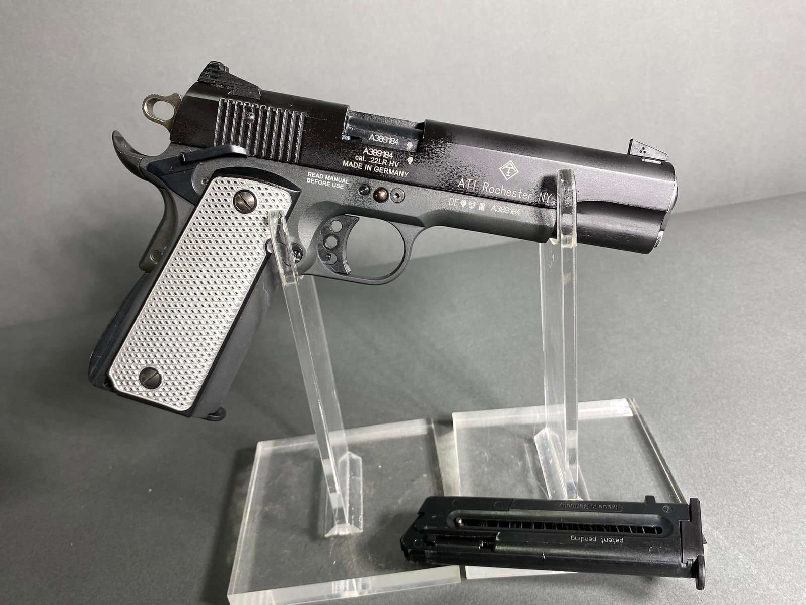 German Sport Guns Model GSG-1911 22 LR Pistol 2 Mags: MFG/IMPORTER: German Sport Guns/ATI MODEL: GGS-1911 SERIAL: A389184 CALIBER/GAUGE: 22LR CONDITION: Action good, bore good. SIZE: 4" bbl. NOTES: 2 magazines AB197