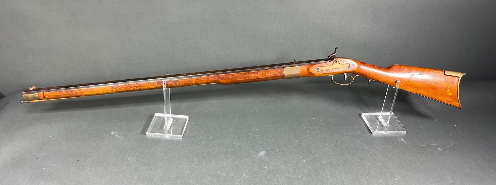 Miroku Ultra Hi Black Powder Hawken Rifle: MFG/IMPORTER: Miroku for Ultra Hi MODEL: Hawken SERIAL: 9056 CALIBER/GAUGE: 45 CONDITION: Action good, bore good. SIZE: 33.5" bbl. This item is either black powder or pre 1898, and thus does not requi