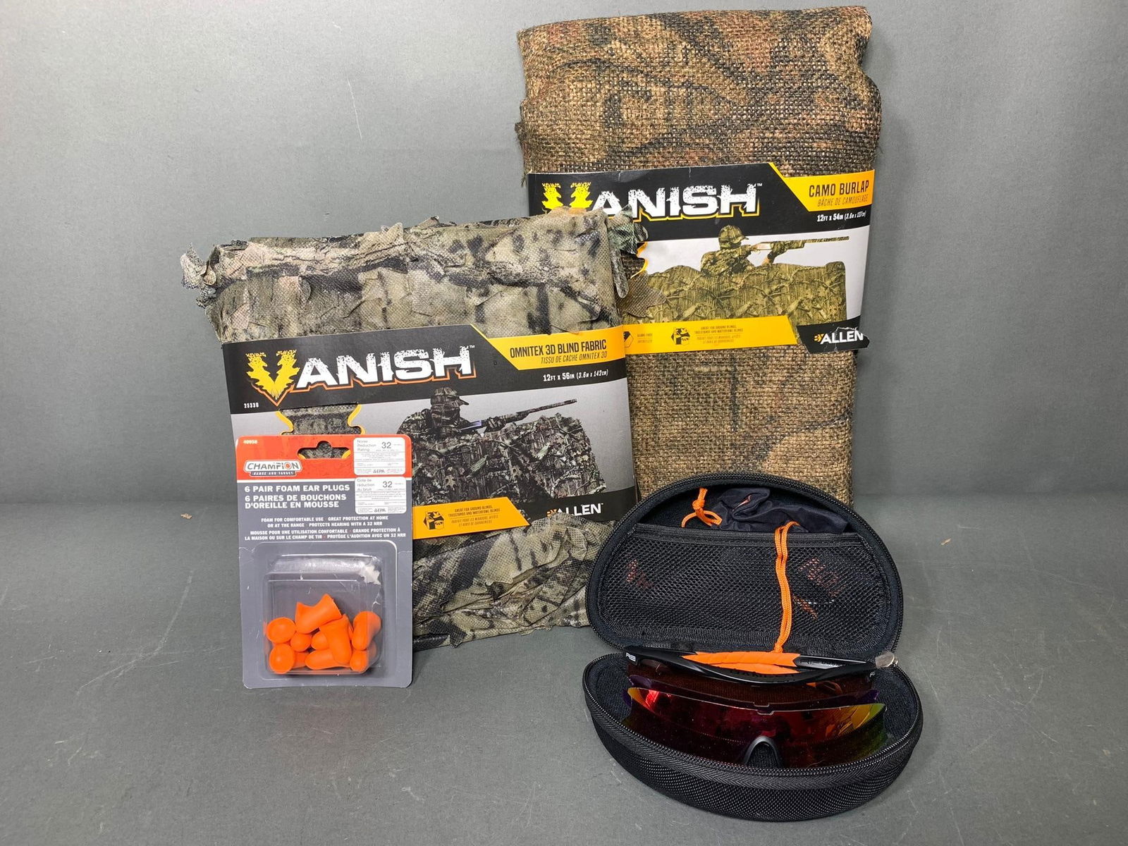 Vanish Camo Netting, earplugs, shooting glasses lot: In-house shipping available. Pickup is Thursday, May 29 from from 1 pm to 7 pm at our gallery in Lancaster, OH 43130 or we will provide in-house shipping for this item. We charge a $5/lot fee if you p