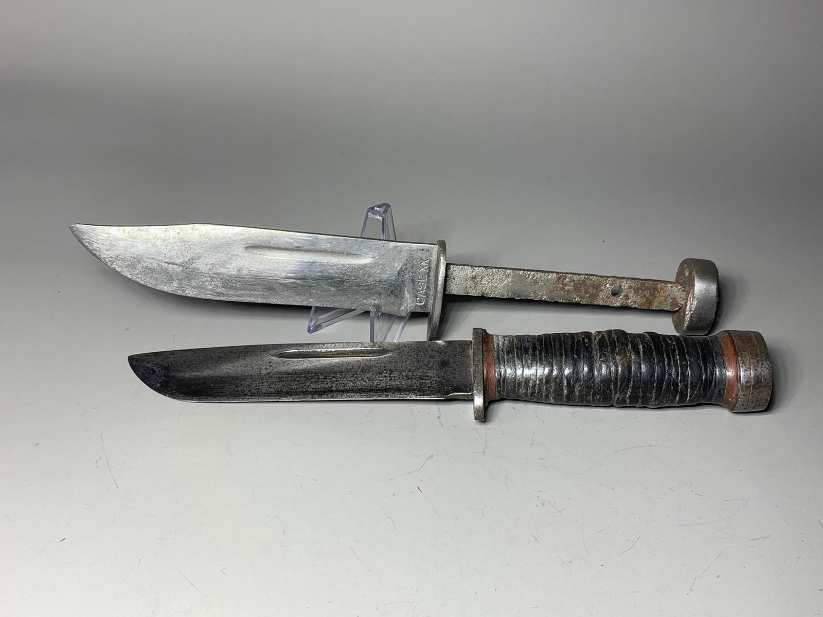 Two WWII Fighting Knives Case XX Quartermaster + Mark Cattaraugus: In-house shipping available. Pickup is Thursday, May 29 from from 1 pm to 7 pm at our gallery in Lancaster, OH 43130 or we will provide in-house shipping for this item. We charge a $5/lot fee if you p