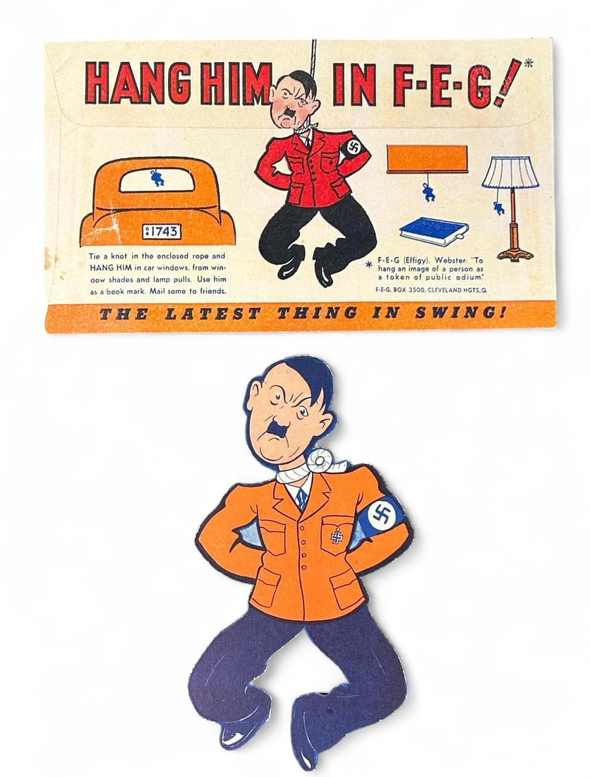 WWII U.S. Homefront Cardboard Adolf Hitler Wearing Noose - "Hang Him In F-E-G" (Effigy): World War Two United States homefront cardboard Adolf Hitler with a noose around his neck. There is a pre cut round tab at the center of the noose. The object of this Hitler novelty was to push out th