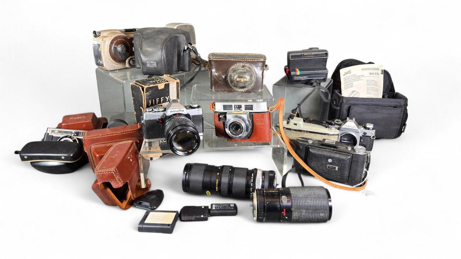 Group Lot of Vintage Cameras, Lenses, Camera Case, Accessories: Burns in-house (bidder arranged option on checkout) shipping available. Pickup is Thursday, June 26 from from 11 am to 7 pm at our gallery in Lancaster, OH 43130 or we will provide in-house shipping f