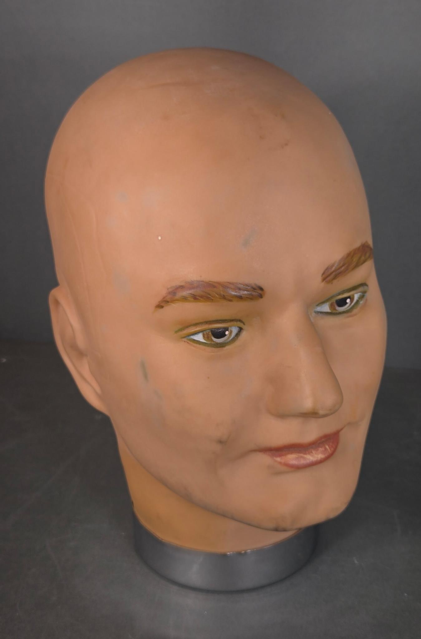 Vintage Plastic or Rubber Mannequin Head: Life sized. Burns in-house (bidder arranged option on checkout) shipping available. Pickup is Thursday, June 26 from from 11 am to 7 pm at our gallery in Lancaster, OH 43130 or we will provide in-hous