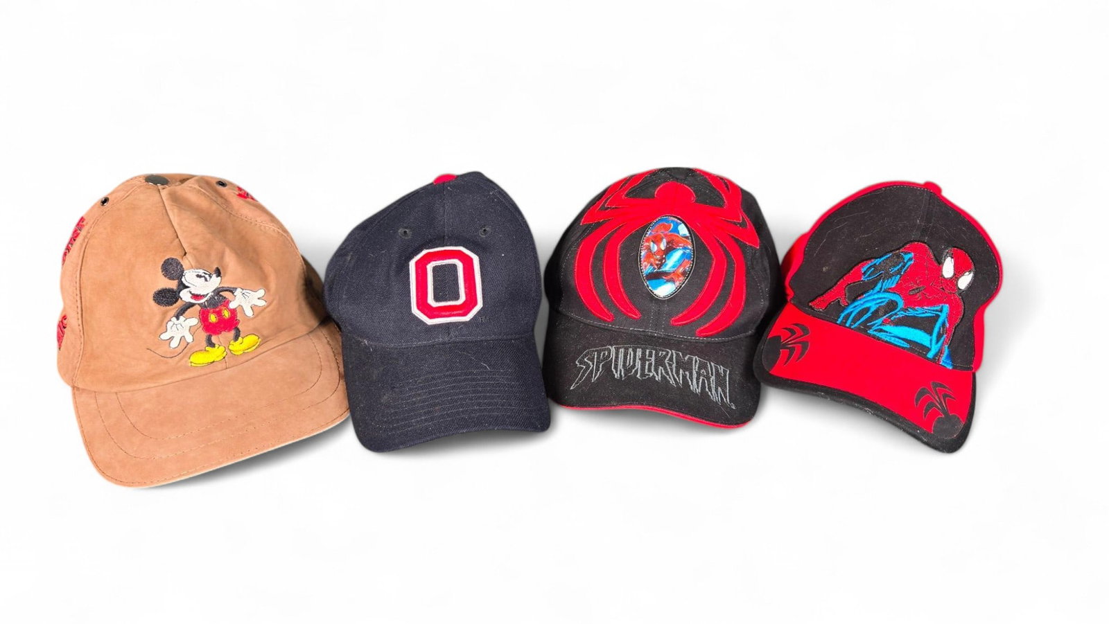 Group Lot of Hats Inc. Spiderman: Burns in-house (bidder arranged option on checkout) shipping available. Pickup is Thursday, June 26 from from 11 am to 7 pm at our gallery in Lancaster, OH 43130 or we will provide in-house shipping f