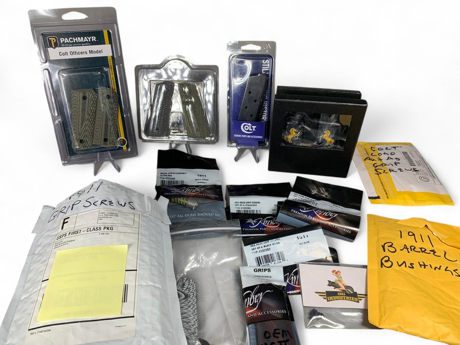 Group Lot Colt 1911 Accessories, Grips, Parts: Burns in-house shipping is available. pick up is Tuesday, July 28, from Noon to 7 pm at our gallery in Lancaster, Ohio 43130 or we will provide in-house shipping for this item. We will charge a $5 fee