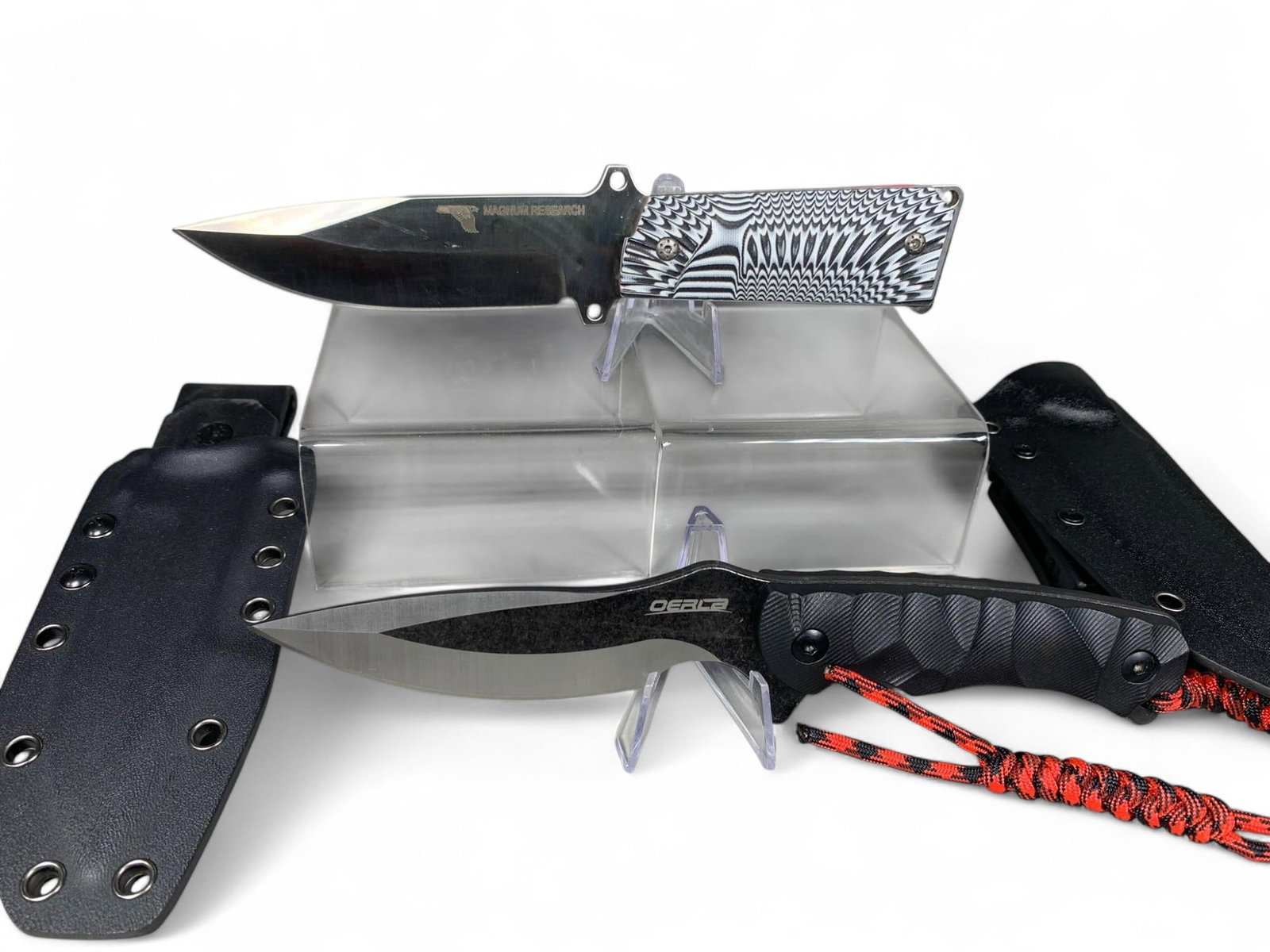2 Sheath Knives - Magnum Research & Oerca: Burns in-house shipping is available. pick up is Tuesday, July 28, from Noon to 7 pm at our gallery in Lancaster, Ohio 43130 or we will provide in-house shipping for this item. We will charge a $5 fee