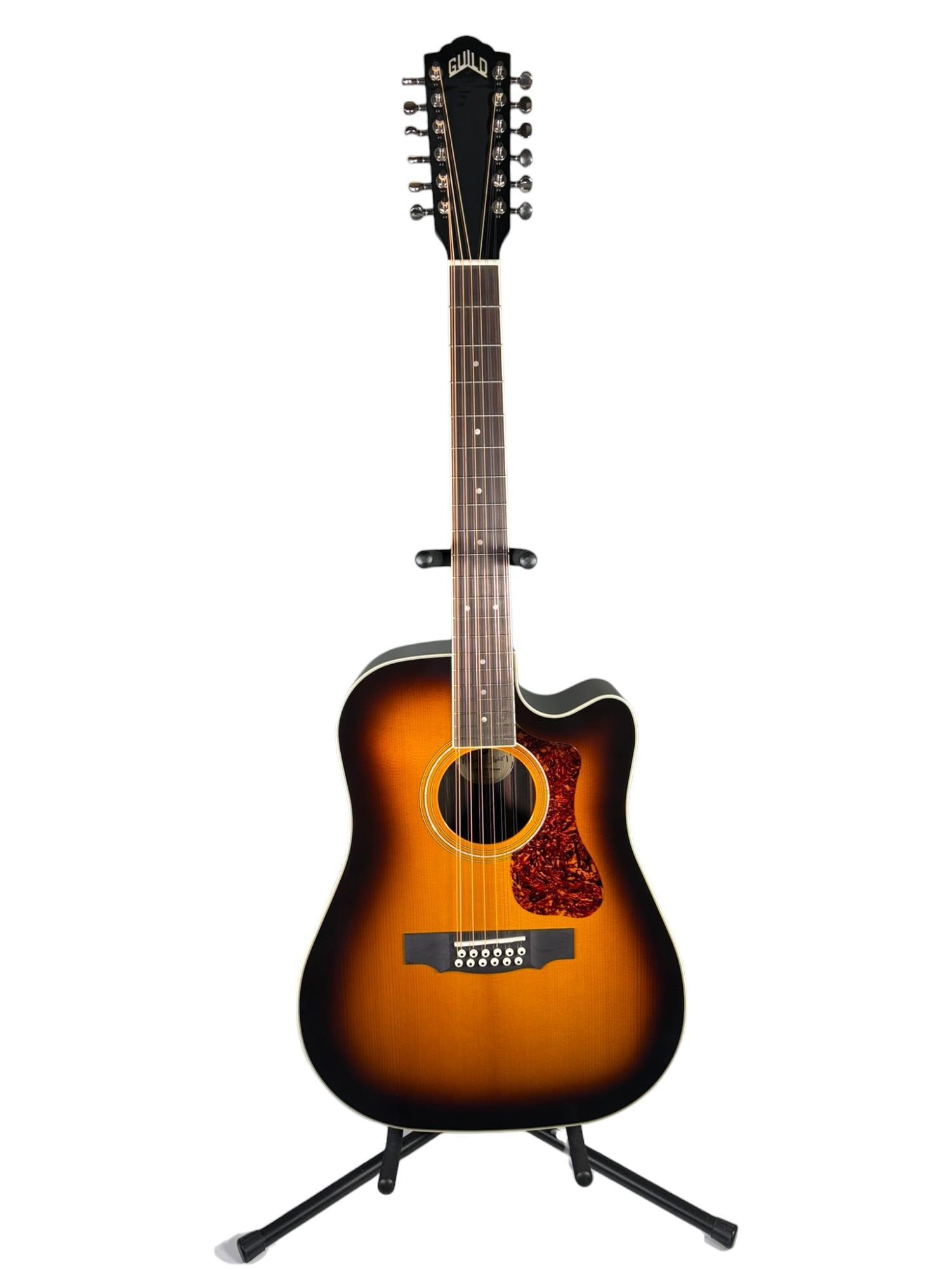 Vintage Guild Model D-2612CE Deluxe Model 12-String Acoustic Guitar with Hard Case: Nice overall. With hard case. Stand not included. Burns in-house shipping is available. pick up is Tuesday, July 28, from Noon to 7 pm at our gallery in Lancaster, Ohio 43130 or we will provide in-hou