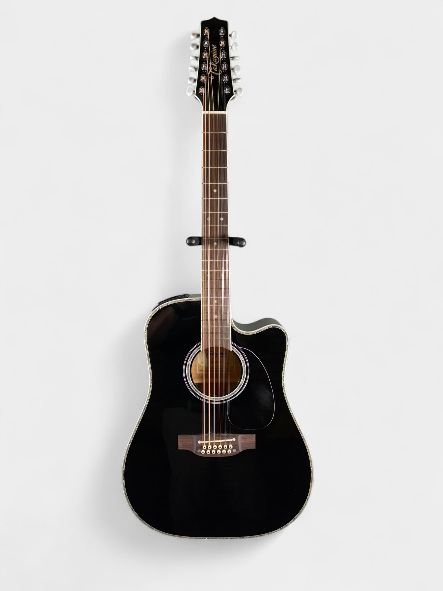 Takamine EF381DX 12-String Acoustic Guitar w/pick up: In hard case. Stand not included. Burns in-house shipping is available. pick up is Tuesday, July 28, from Noon to 7 pm at our gallery in Lancaster, Ohio 43130 or we will provide in-house shipping for