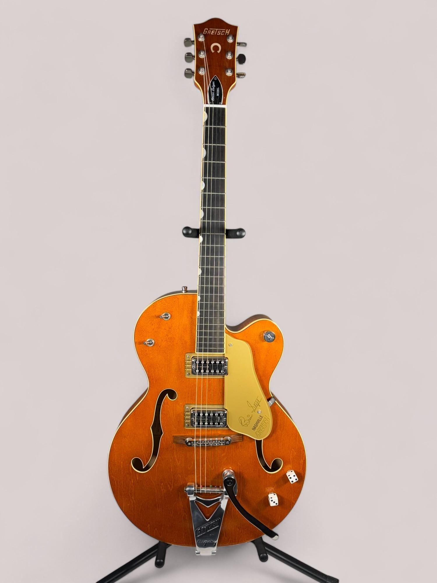 Rare Gretsch Electric Guitar Brian Setzer Signature with hard case: Model: G6120-BSNV-SMK. Nice! In hard case. Burns in-house shipping is available. pick up is Tuesday, July 28, from Noon to 7 pm at our gallery in Lancaster, Ohio 43130 or we will provide in-house ship