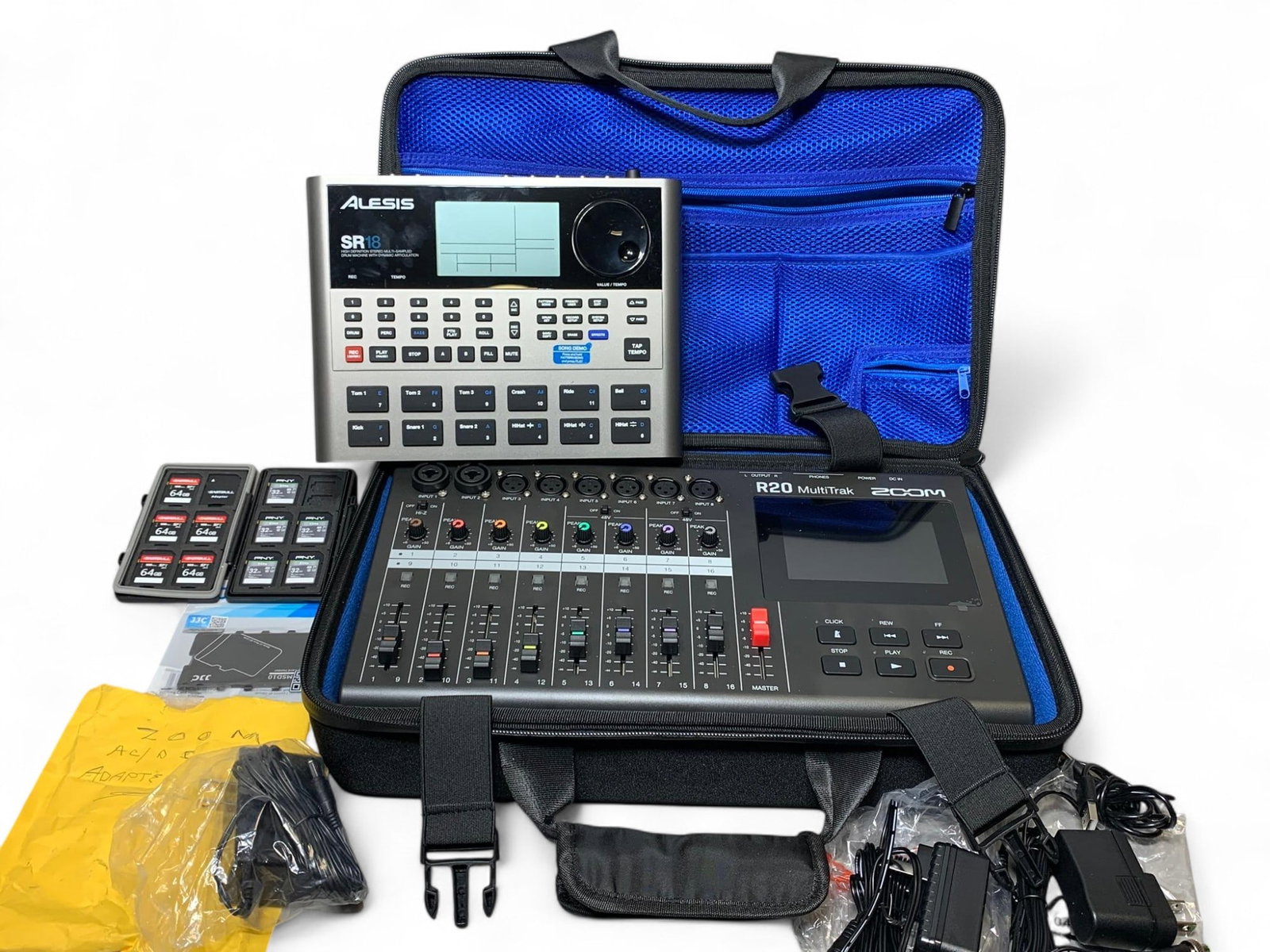Alesis SR-18 Drum Machine & Zoom R20 Multi Track 16 Track Recorder with Case: Powers up. Burns in-house shipping is available. pick up is Tuesday, July 28, from Noon to 7 pm at our gallery in Lancaster, Ohio 43130 or we will provide in-house shipping for this item. We will char
