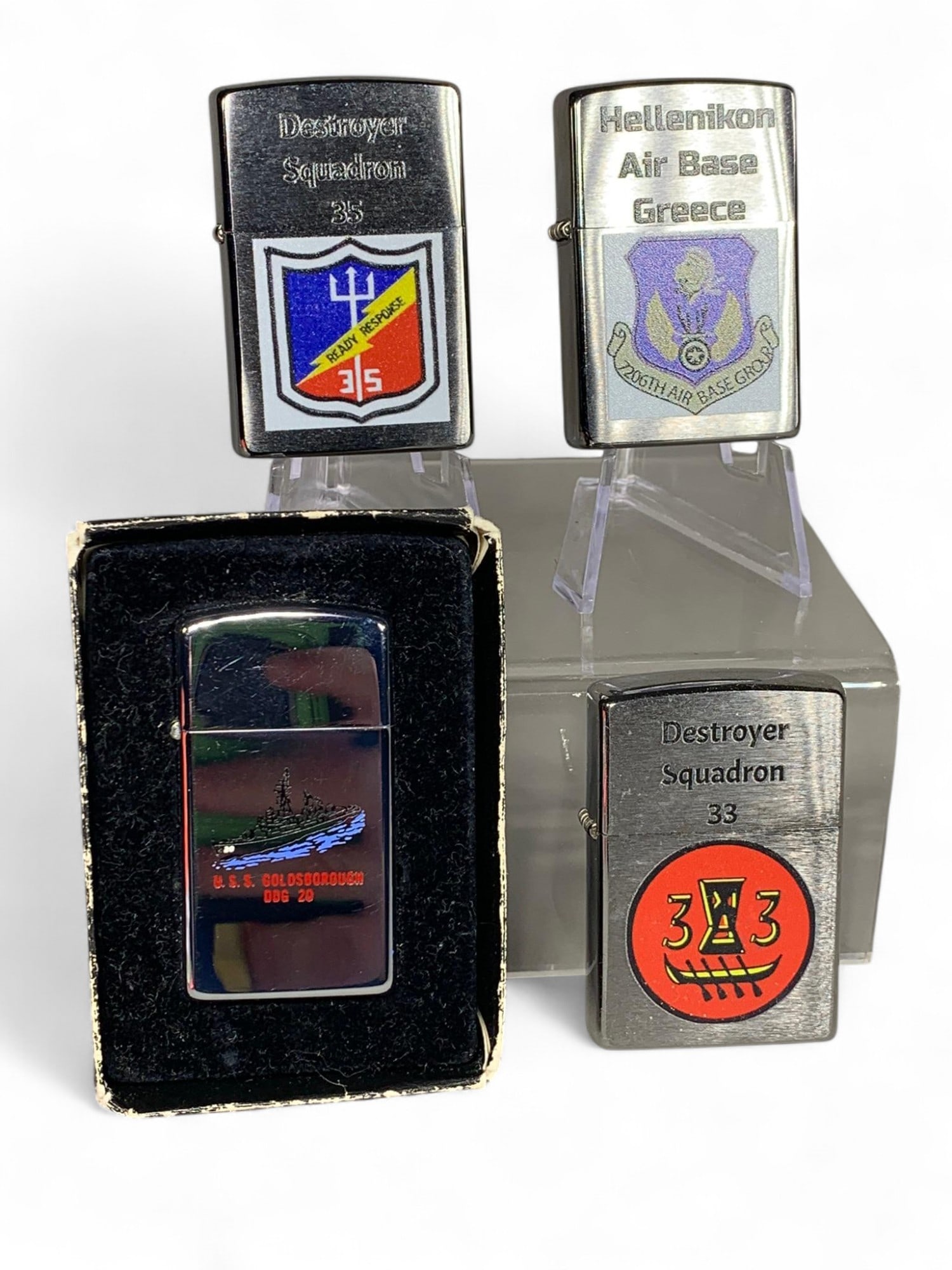 Group Lot Military Related Zippo Lighters: Burns in-house shipping is available. pick up is Tuesday, July 28, from Noon to 7 pm at our gallery in Lancaster, Ohio 43130 or we will provide in-house shipping for this item. We will charge a $5 fee