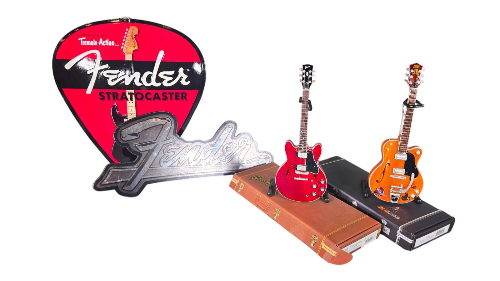 Miniature Gibson Gretsch Guitars, Fender Signs: Burns in-house shipping is available. pick up is Tuesday, July 28, from Noon to 7 pm at our gallery in Lancaster, Ohio 43130 or we will provide in-house shipping for this item. We will charge a $5 fee