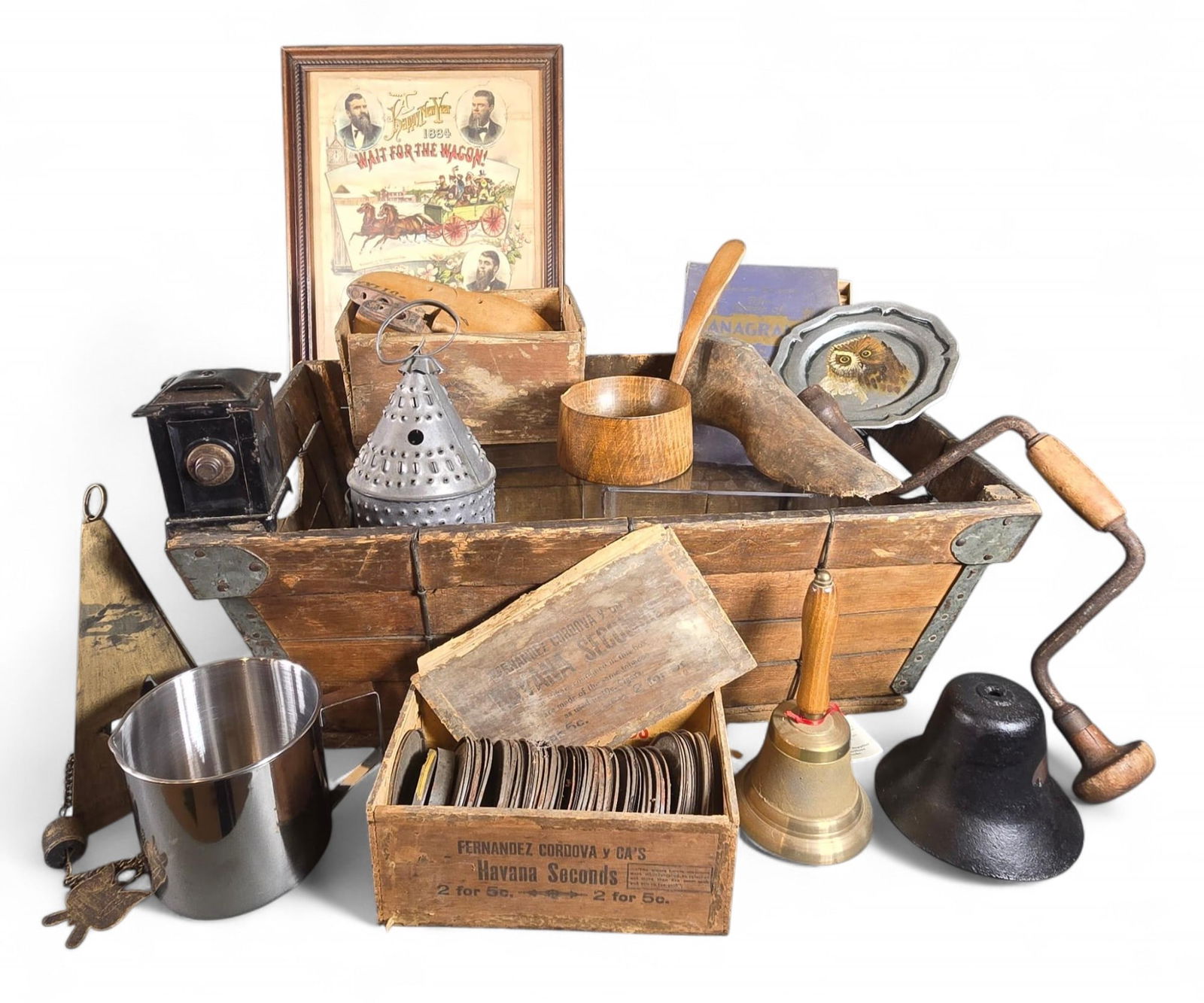 Group of Primitive Antiques: Wood Box, Tools, Tin Lantern, Cigar Box Full of Safe Seal Lids, More: Anagram game, newer Stainless pot and Ohio Dinner Bell & More. Burns in-house shipping is available. pick up is Tuesday, July 28, from Noon to 7 pm at our gallery in Lancaster, Ohio 43130 or we will p