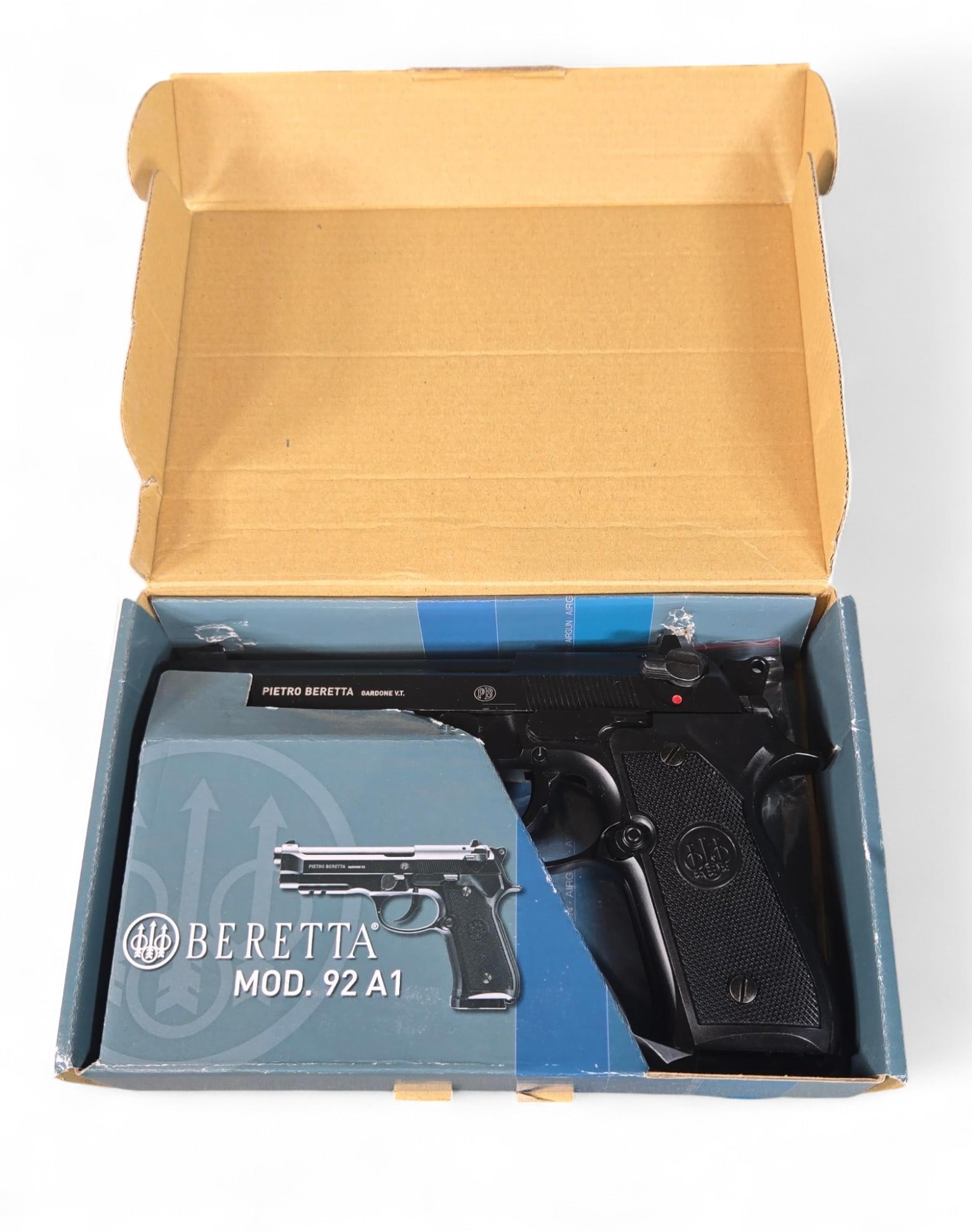 Beretta Model 91 A1 Style Air Pistol in Box: Burns in-house shipping is available. pick up is Tuesday, July 28, from Noon to 7 pm at our gallery in Lancaster, Ohio 43130 or we will provide in-house shipping for this item. We will charge a $5 fee