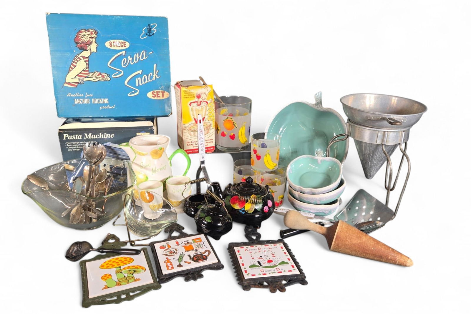 Vintage Ceramic and Cast Iron Trivets, Red Ware Hand Painted Tea Set, Napcoware Juice Set, More: Clear Glass Fruit Glasses, Ice Cream Scoop and other Vintage Kitchen Items. Burns in-house shipping is available. pick up is Tuesday, July 28, from Noon to 7 pm at our gallery in Lancaster, Ohio 43130