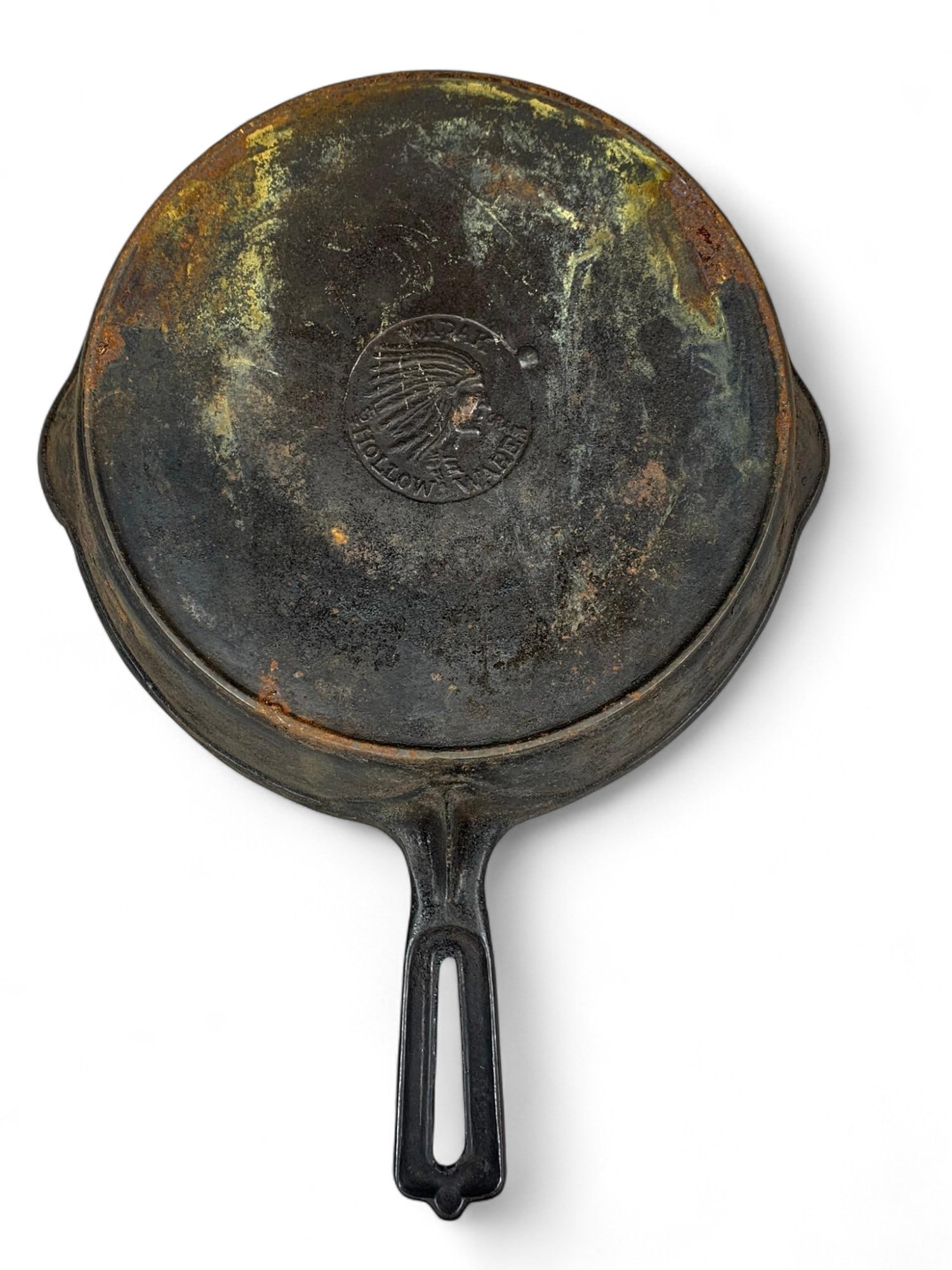 Antique Wapak Hollow Ware Indian Head Cast Iron No. 7 Skillet: Lies flat no spin or wobble. Burns in-house shipping is available. pick up is Friday, August 29, from Noon to 7 pm at our gallery in Lancaster, Ohio 43130 or we will provide in-house shipping for this