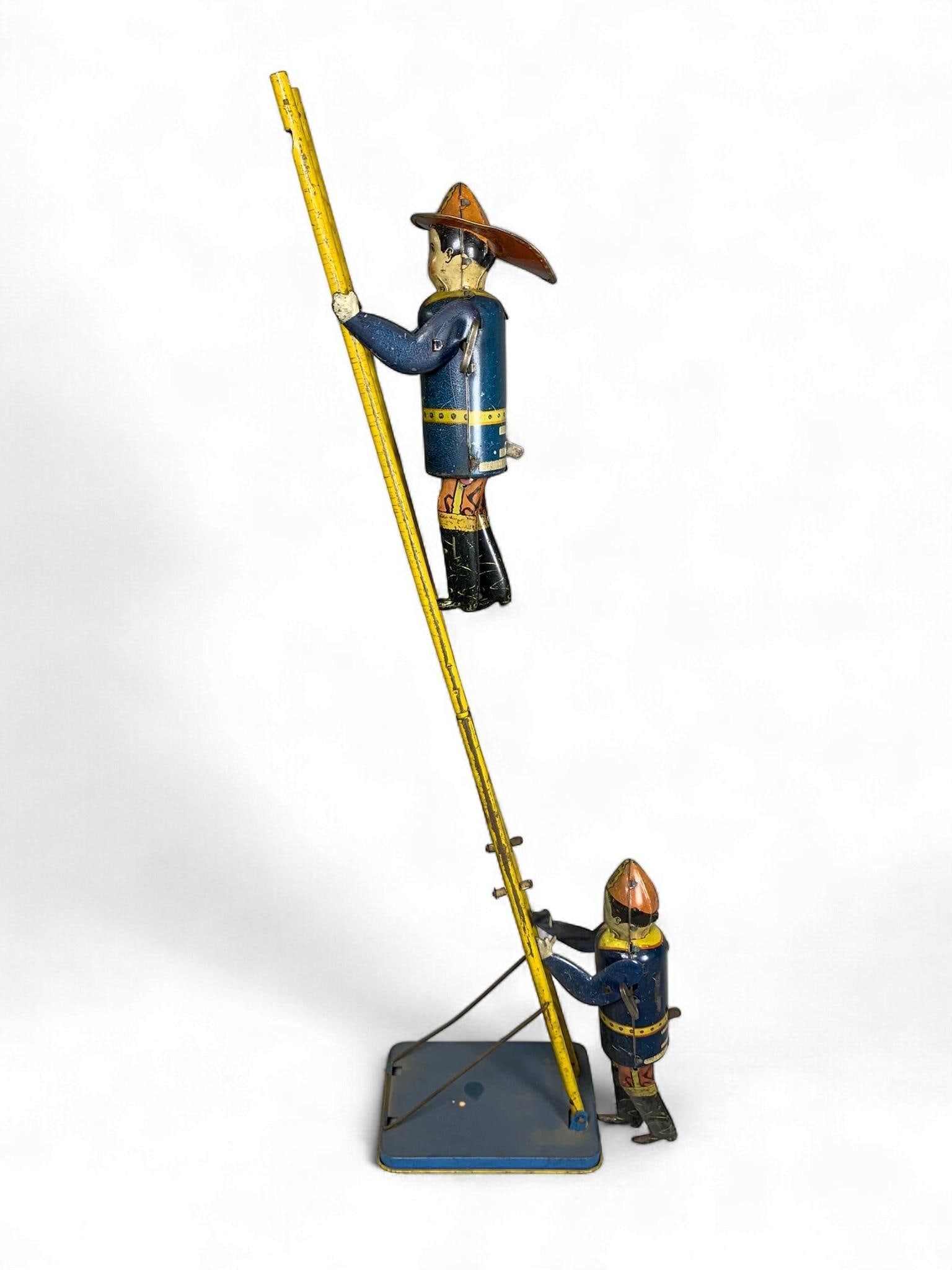Louis Marx & Co. 'Smokey Joe' Climbing Fireman Wind-Up Tin Toy, circa 1930s (1 of 7)